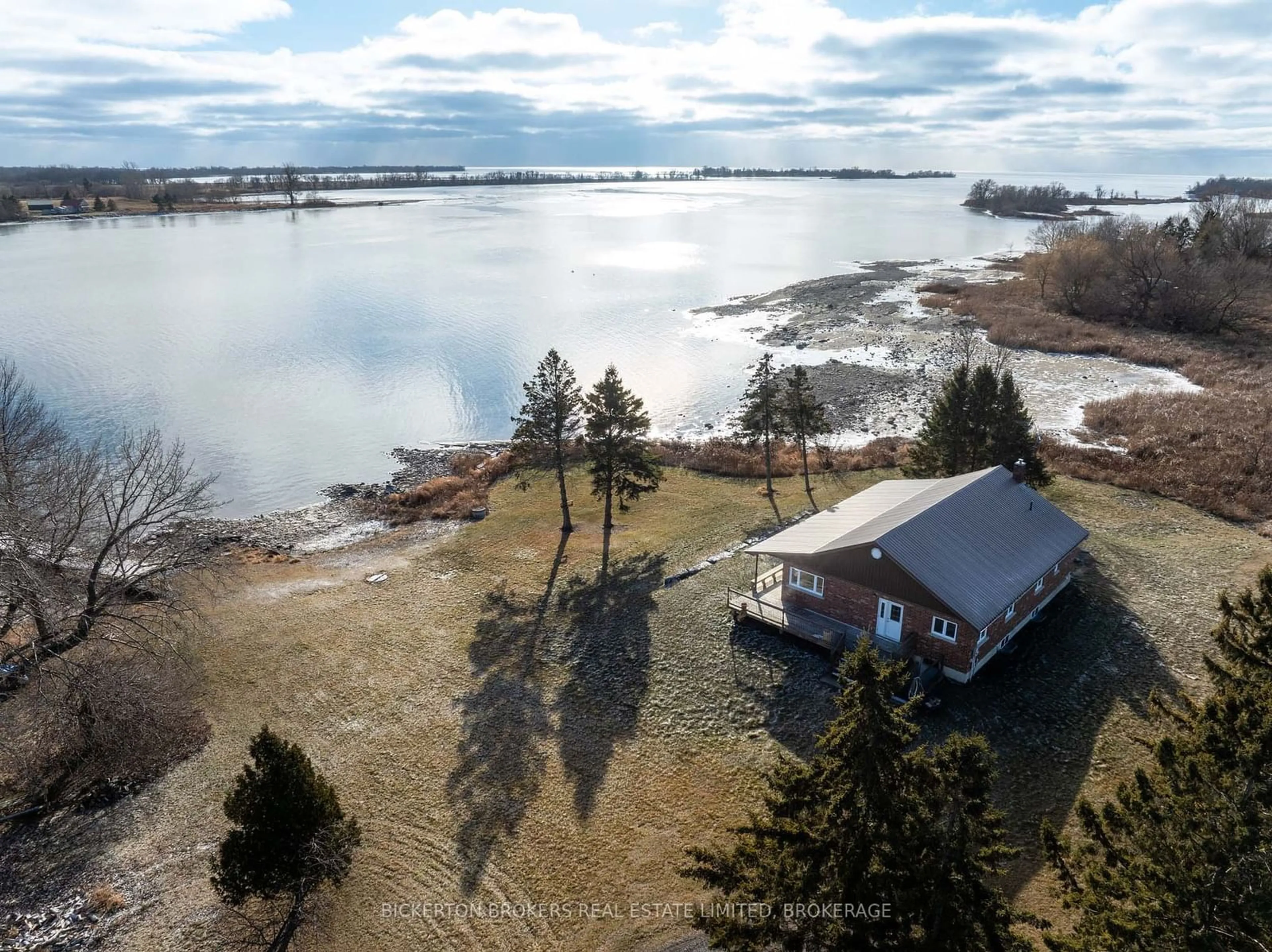 A pic from outside/outdoor area/front of a property/back of a property/a pic from drone, water/lake/river/ocean view for 1125 Nine Mile Point Rd, Frontenac Islands Ontario K0H 2Y0