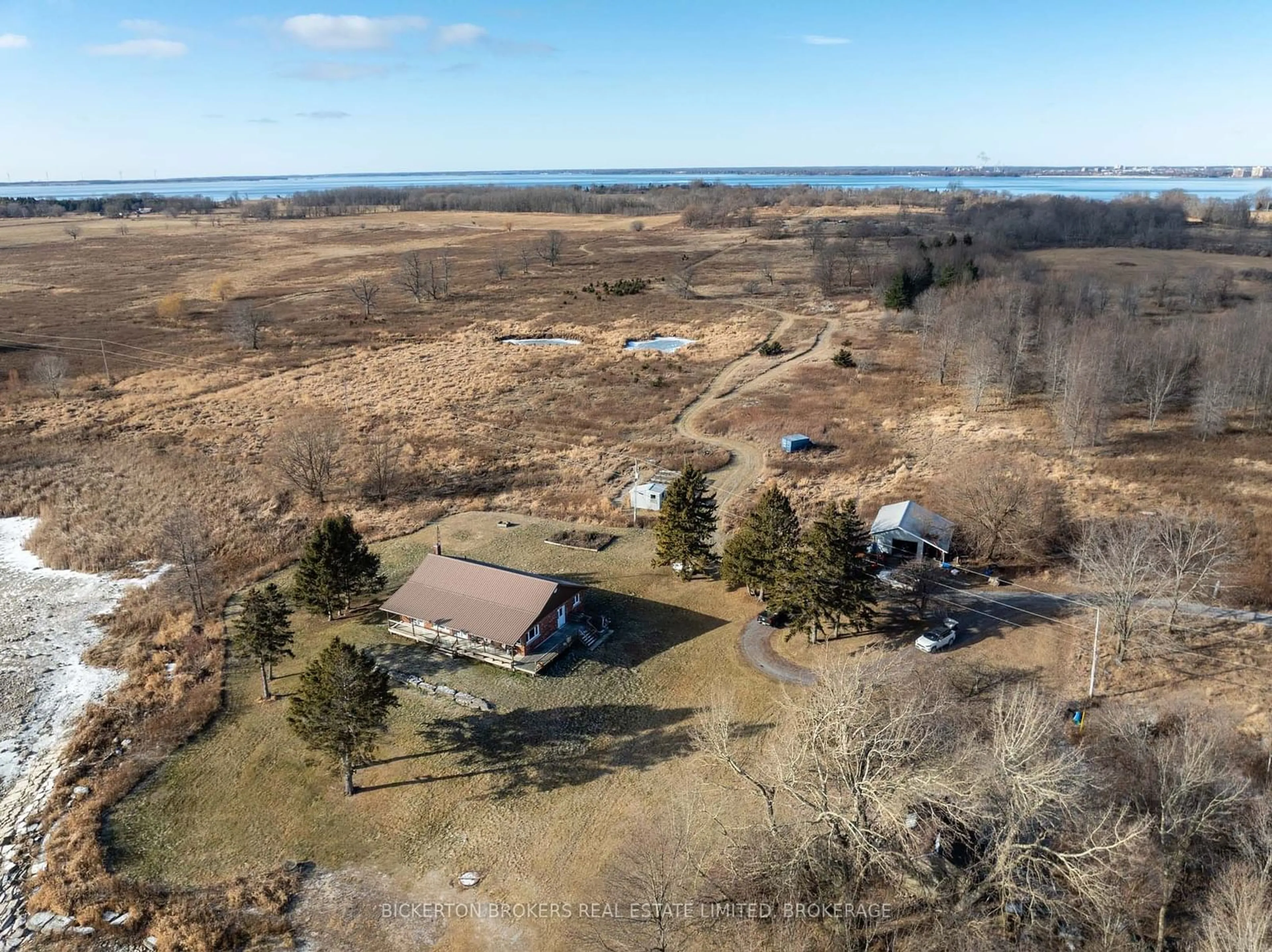 A pic from outside/outdoor area/front of a property/back of a property/a pic from drone, water/lake/river/ocean view for 1125 Nine Mile Point Rd, Frontenac Islands Ontario K0H 2Y0