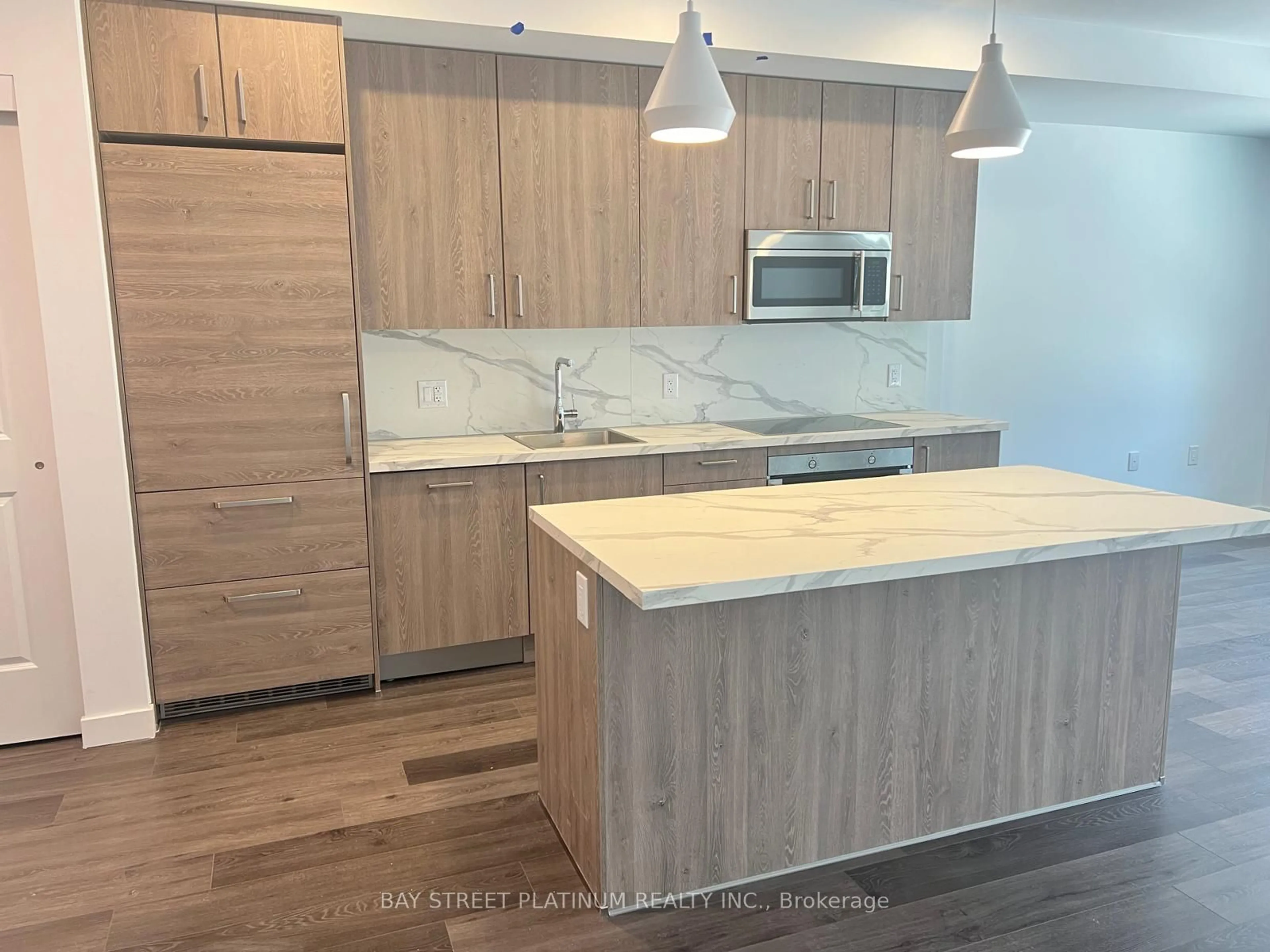 Open concept kitchen, wood/laminate floor for 7945 Kalar Rd #17, Niagara Falls Ontario L2H 2Y6