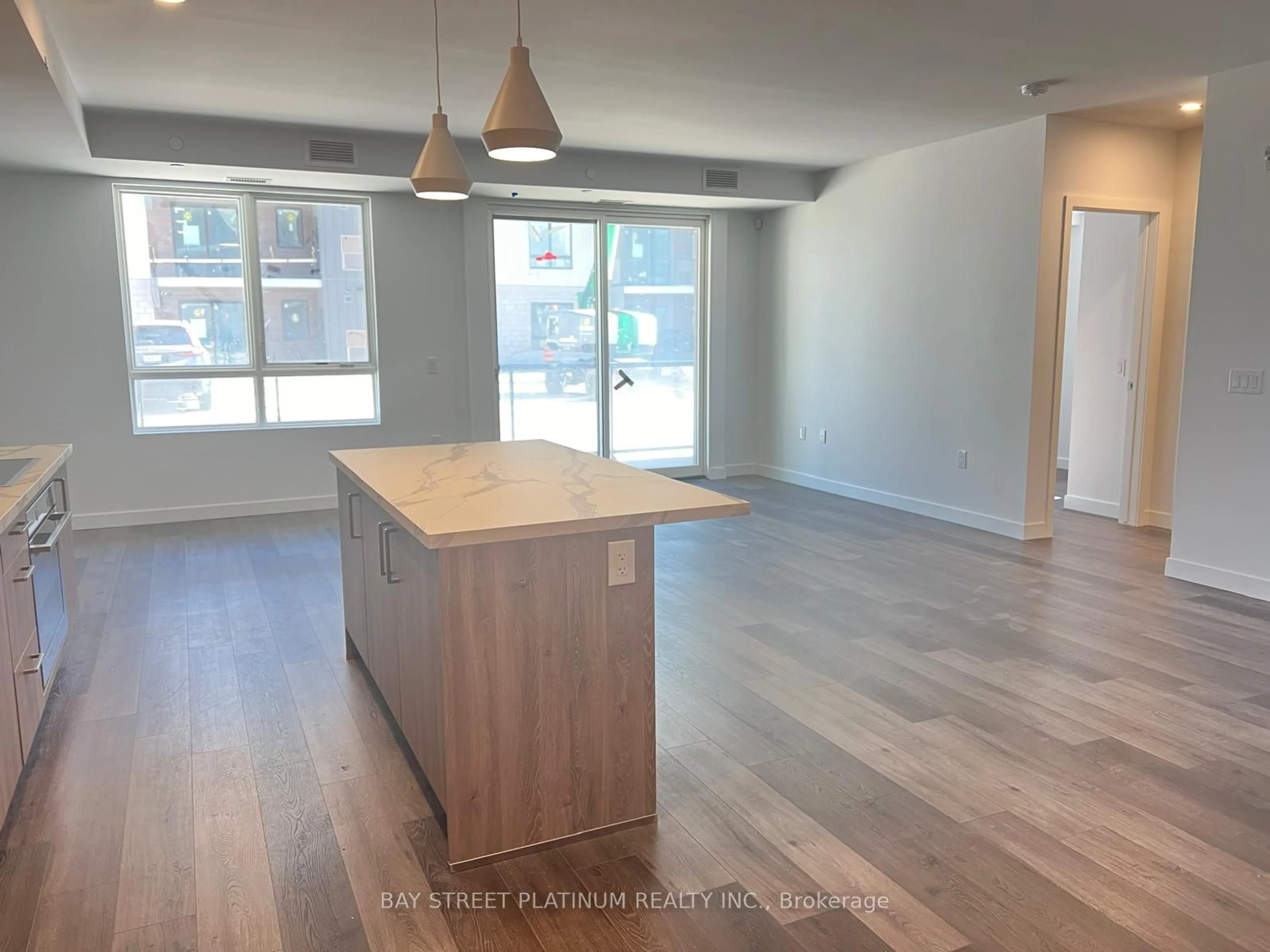 Open concept kitchen, wood/laminate floor for 7945 Kalar Rd #17, Niagara Falls Ontario L2H 2Y6