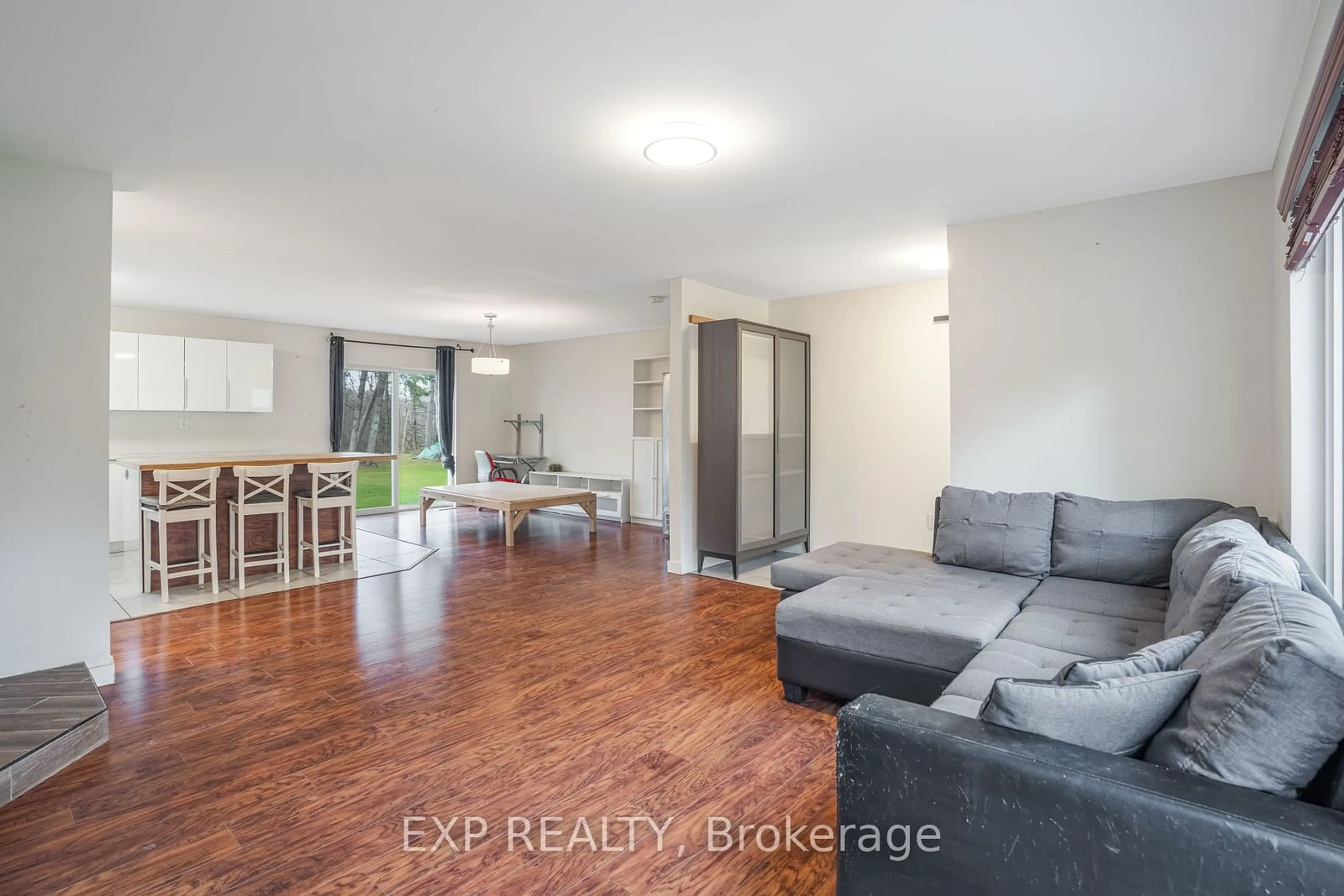 Living room with furniture, wood/laminate floor for 277 Belvedere Rd, Clarence-Rockland Ontario K0A 2A0