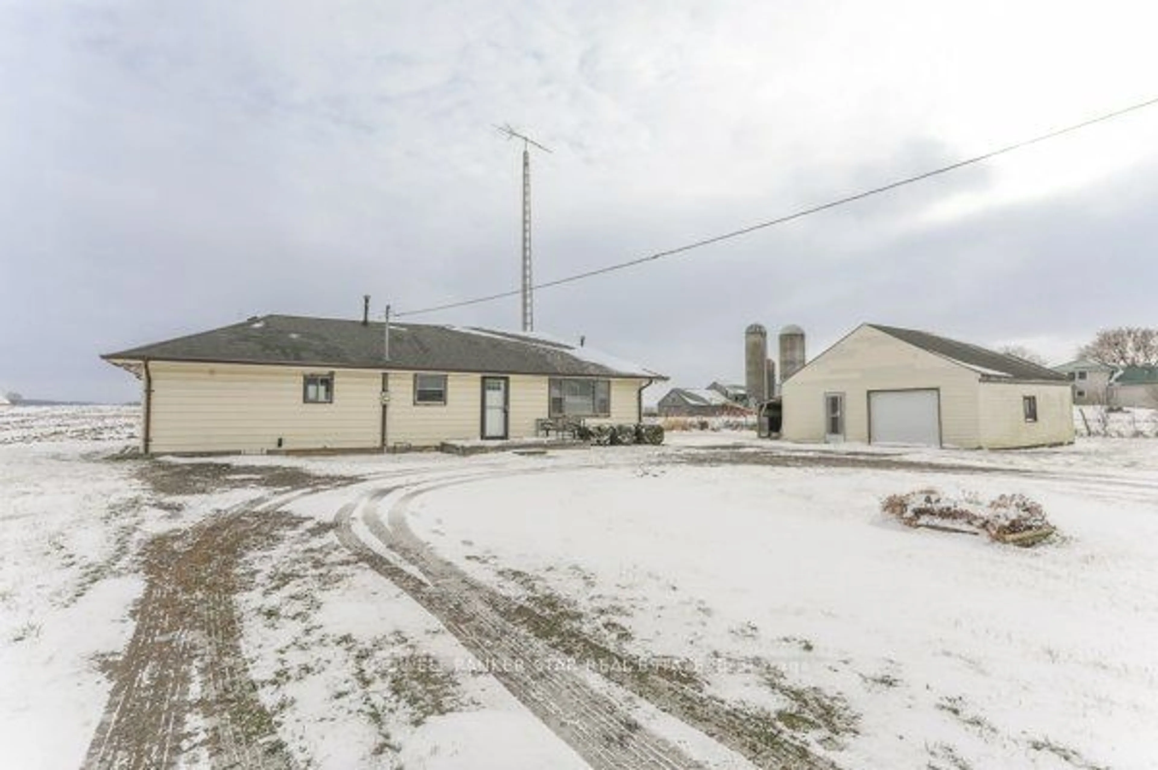 A pic from outside/outdoor area/front of a property/back of a property/a pic from drone, street for 37271 Talbot Line, Southwold Ontario N0L 2E0