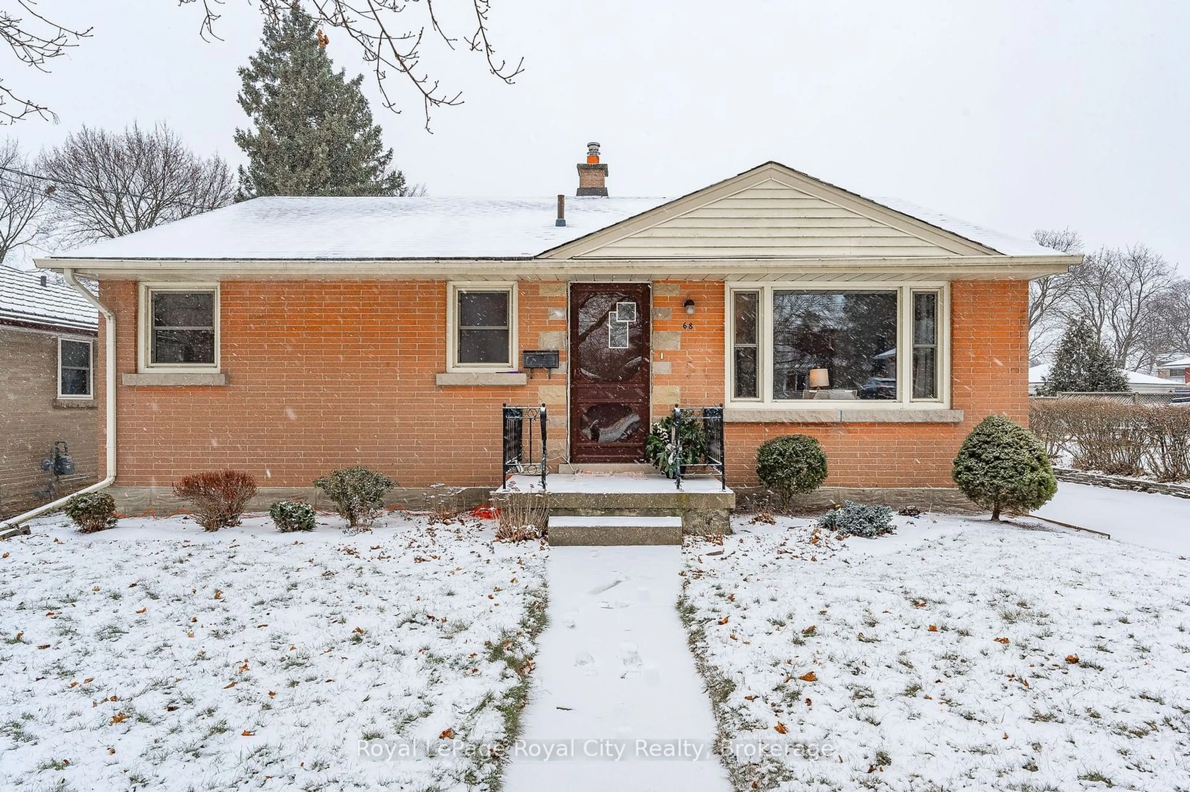 Home with brick exterior material, street for 68 Vancouver Dr, Guelph Ontario N1E 2E9