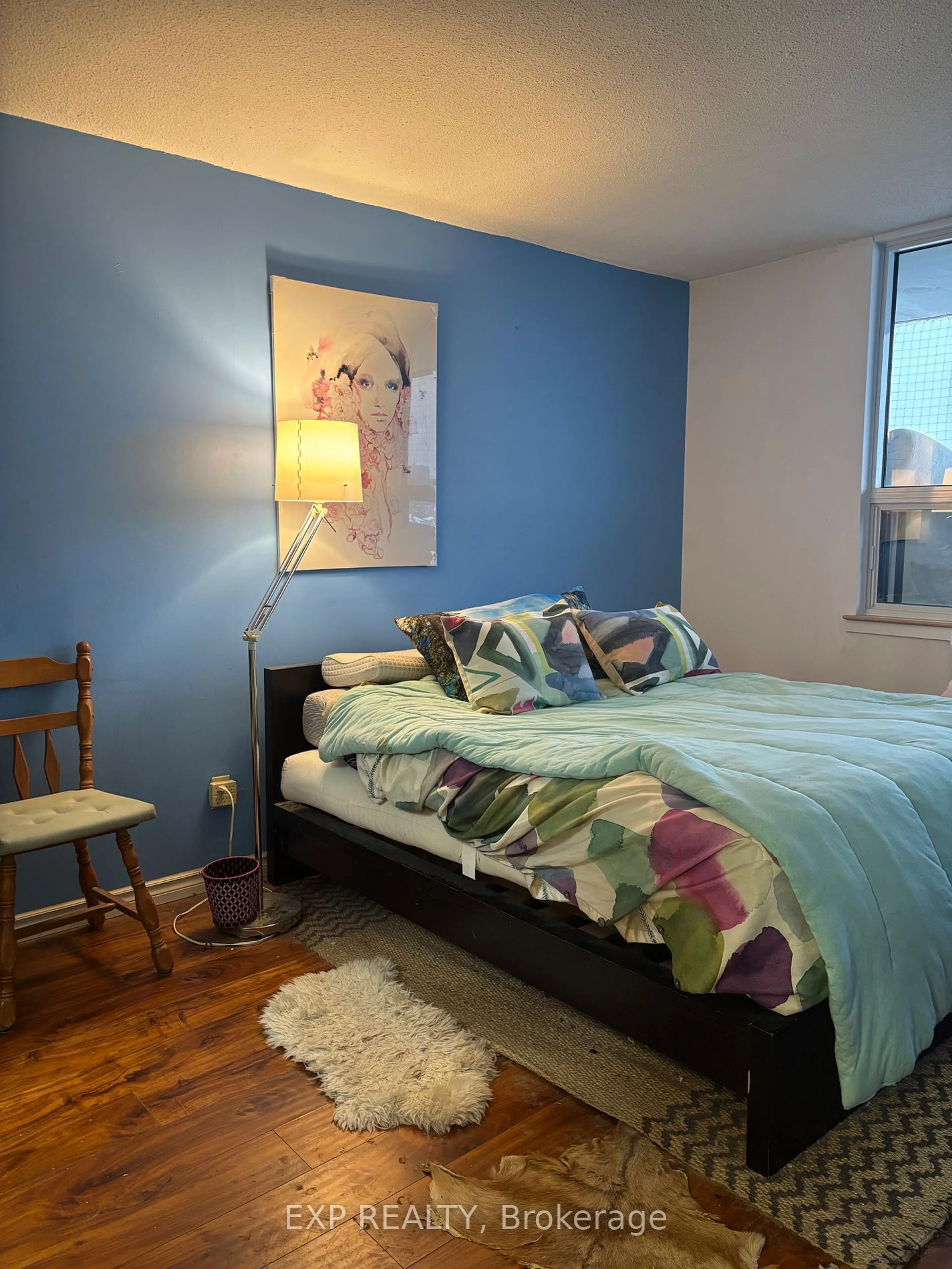 Bedroom with bed, wood/laminate floor for 900 Dynes Rd #707, Mooneys Bay - Carleton Heights and Area Ontario K2C 3L6