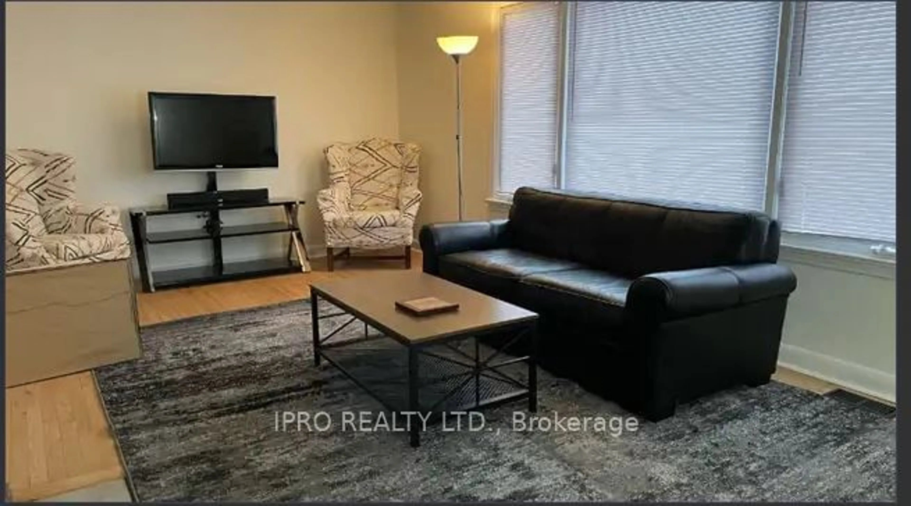 Living room with furniture, wood/laminate floor for 308283 Hockley Rd, Mono Ontario L9W 6N3