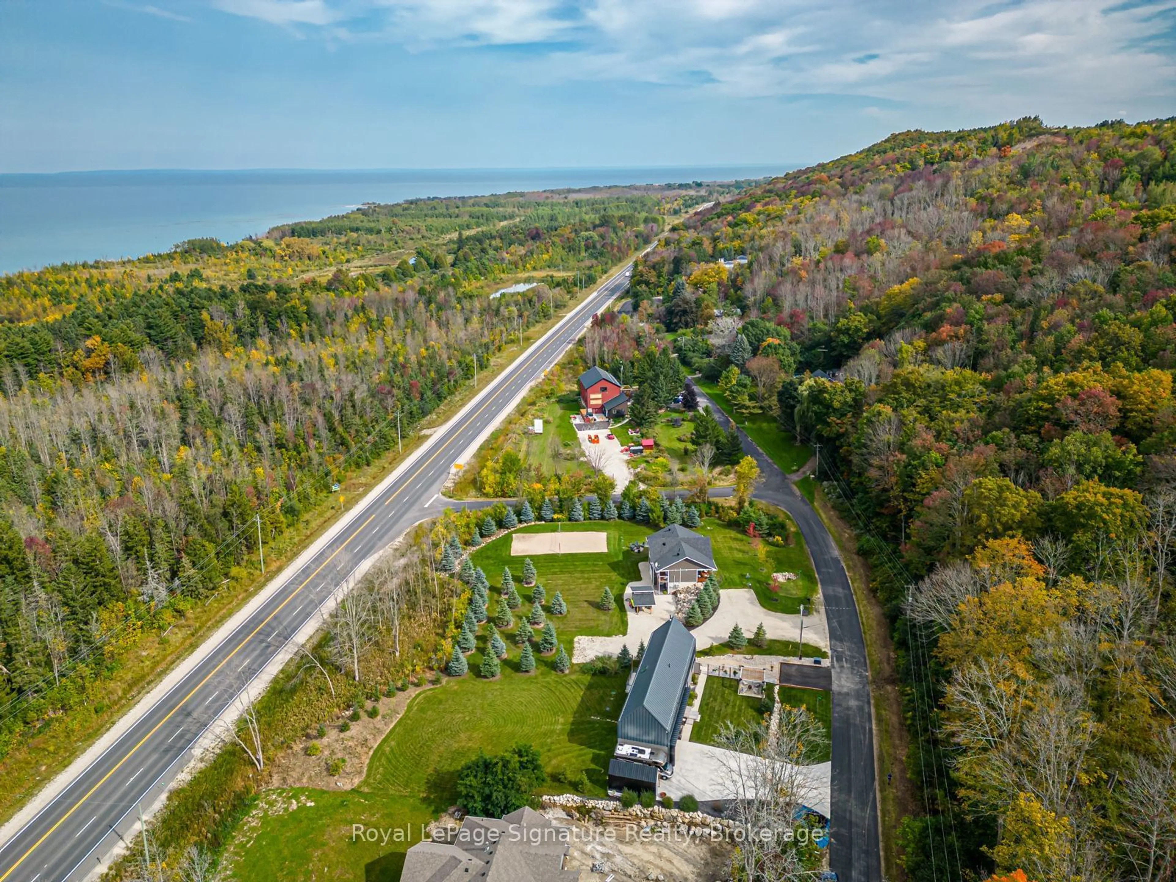 A pic from outside/outdoor area/front of a property/back of a property/a pic from drone, water/lake/river/ocean view for 131 Old Highway 26, Meaford Ontario N4L 1W7