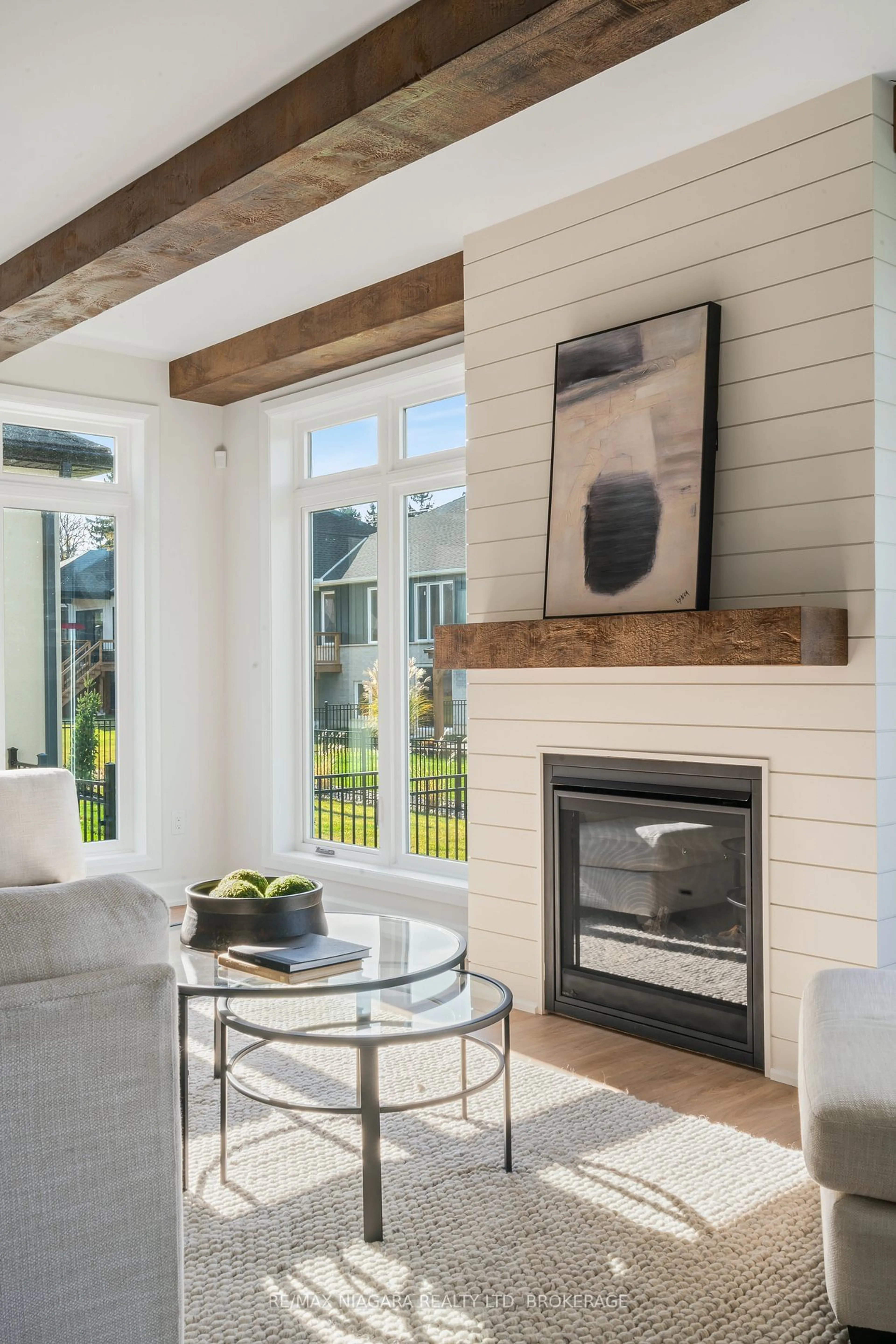 Living room with furniture, wood/laminate floor for 26 Harvest Dr, Niagara-on-the-Lake Ontario L0S 1J0