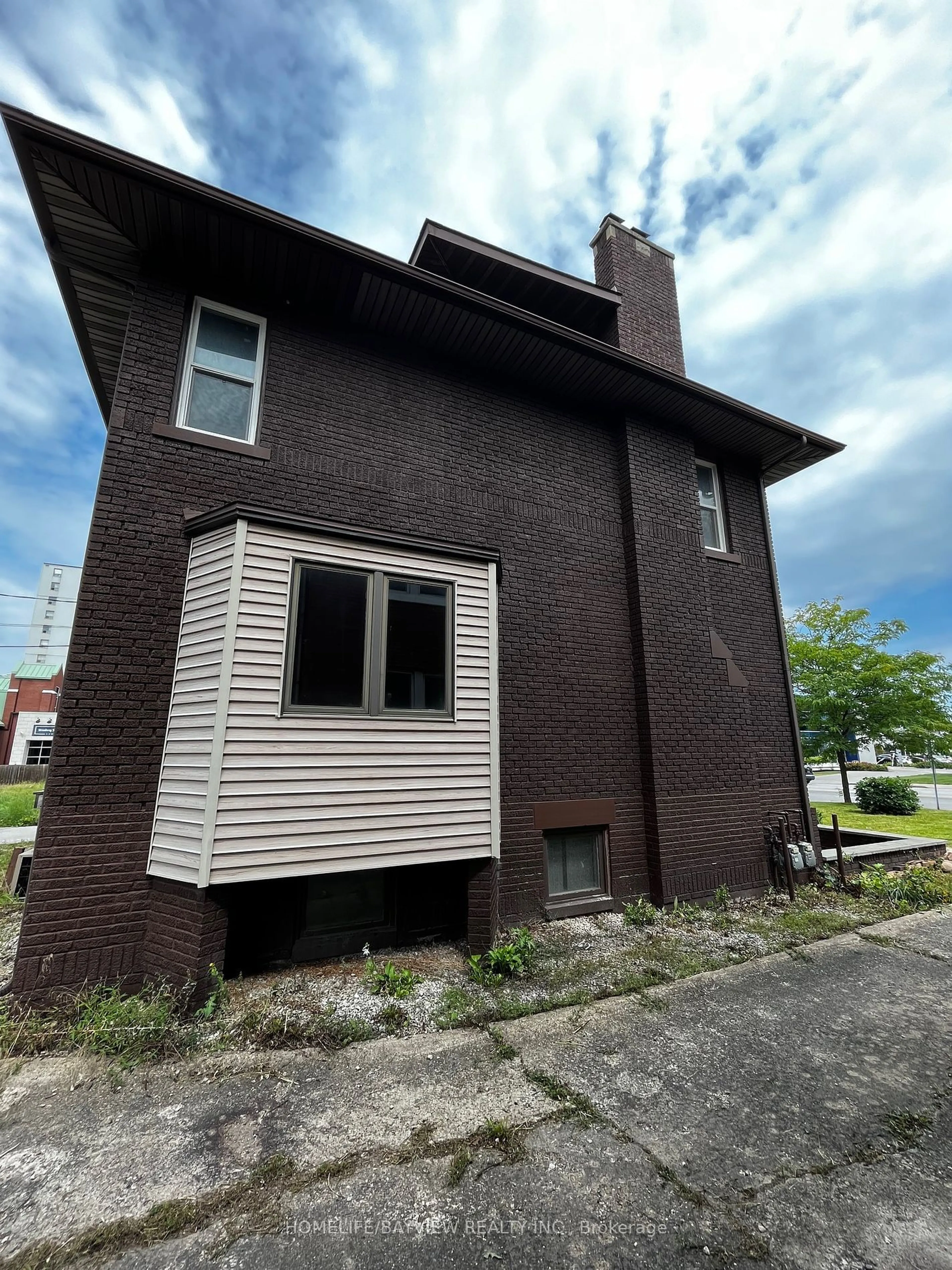 Home with brick exterior material, building for 1575 ouellette ave Ave, Windsor Ontario N8X 1K5