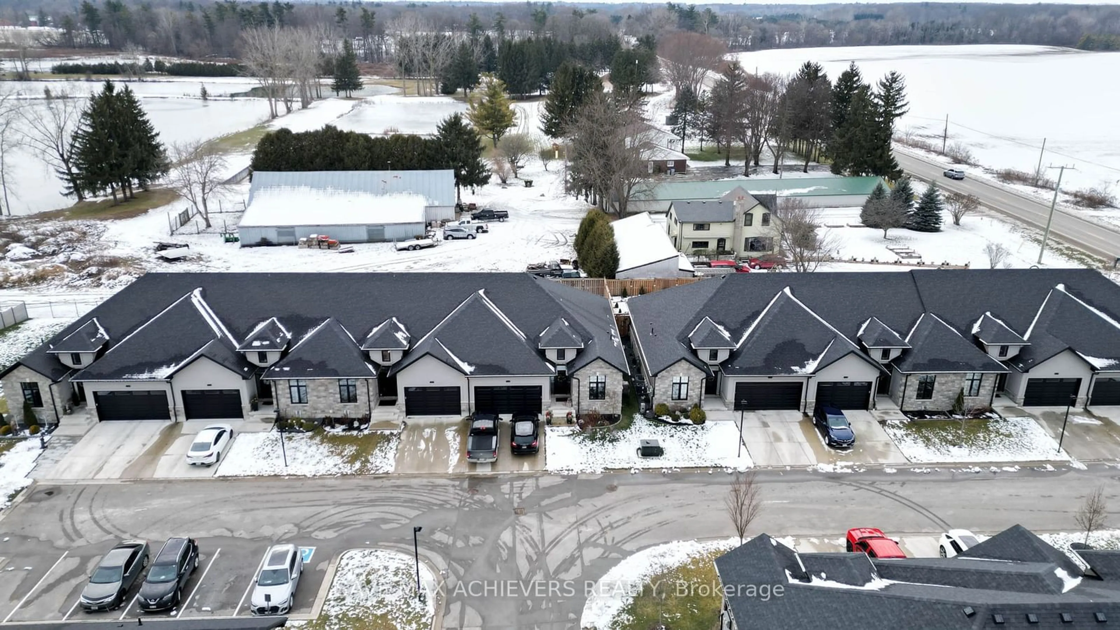 A pic from outside/outdoor area/front of a property/back of a property/a pic from drone, unknown for 9861 Glendon Dr #403, Middlesex Centre Ontario N0L 1R0