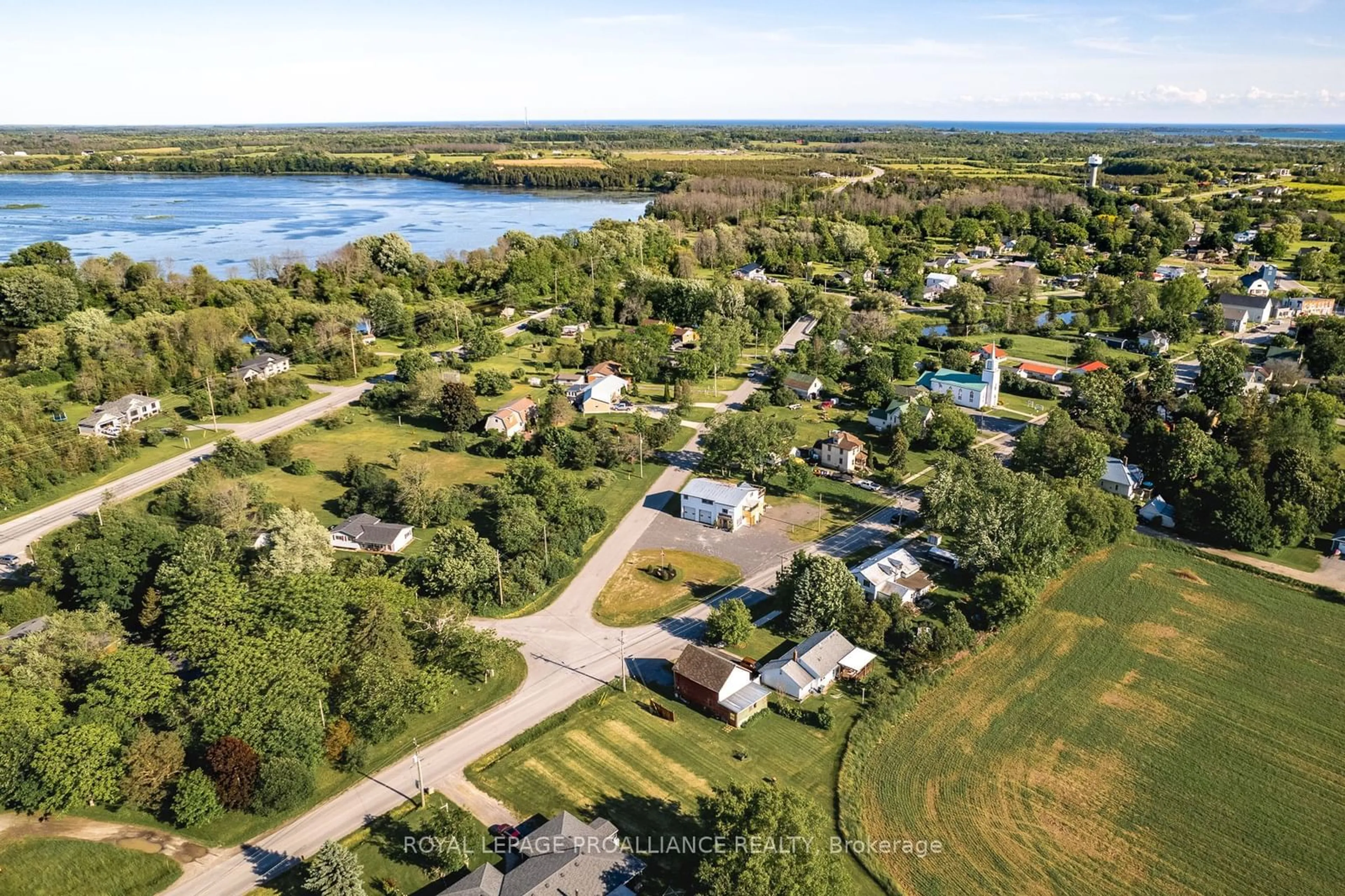 A pic from outside/outdoor area/front of a property/back of a property/a pic from drone, water/lake/river/ocean view for 248 Consecon Main St, Prince Edward County Ontario K0K 1T0