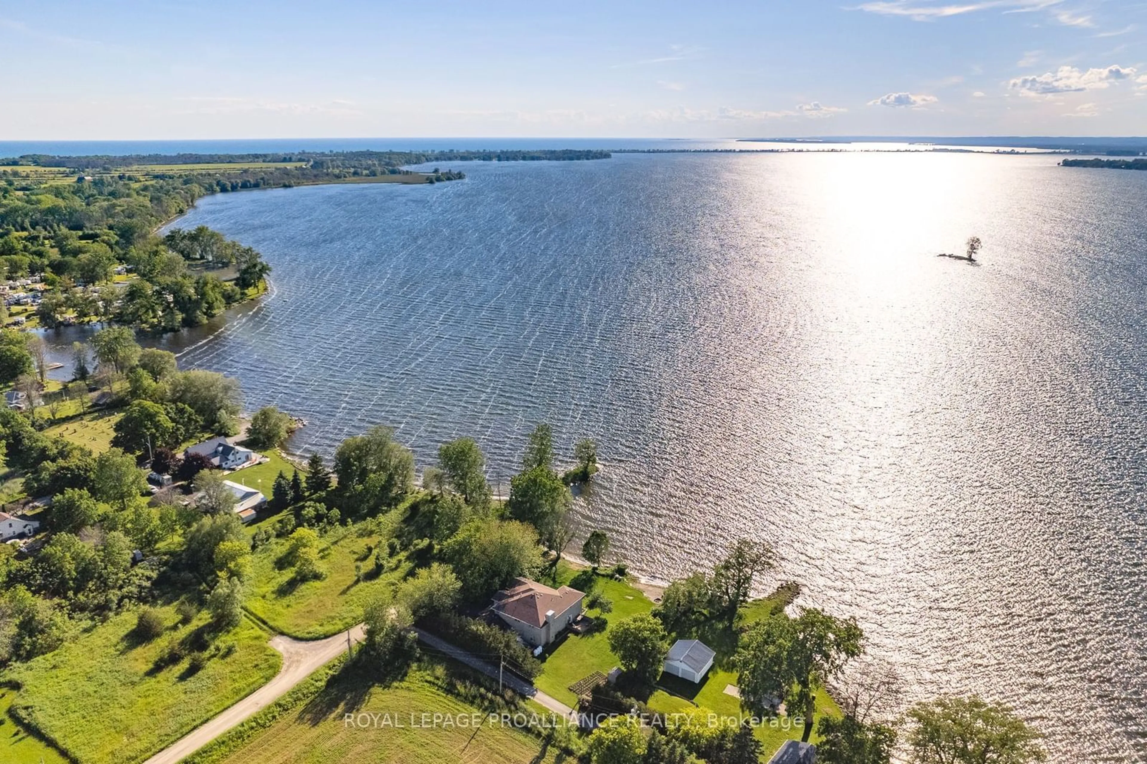 A pic from outside/outdoor area/front of a property/back of a property/a pic from drone, water/lake/river/ocean view for 248 Consecon Main St, Prince Edward County Ontario K0K 1T0