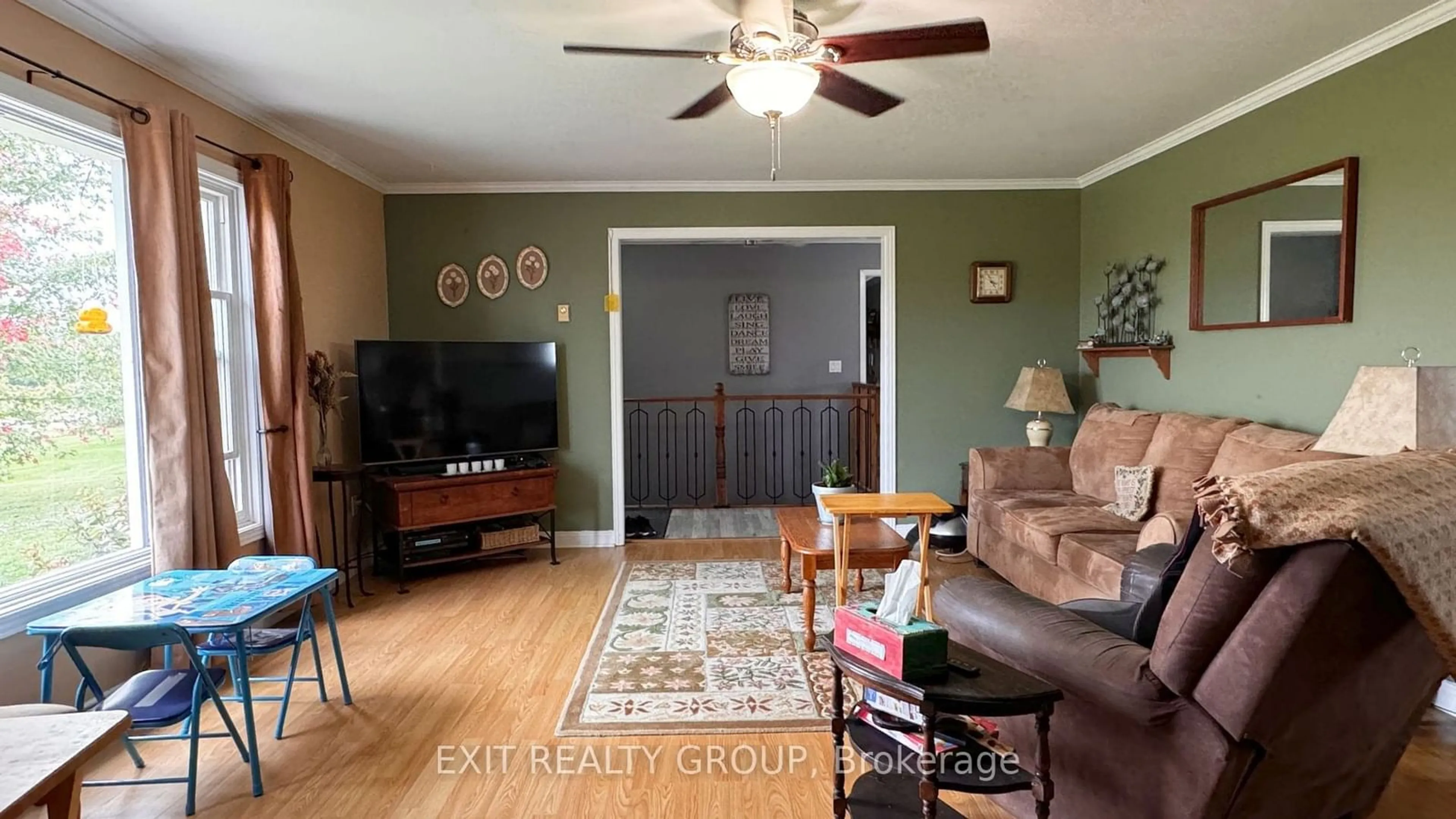 Living room with furniture, wood/laminate floor for 105 County Road 12, Greater Napanee Ontario K0K 2W0