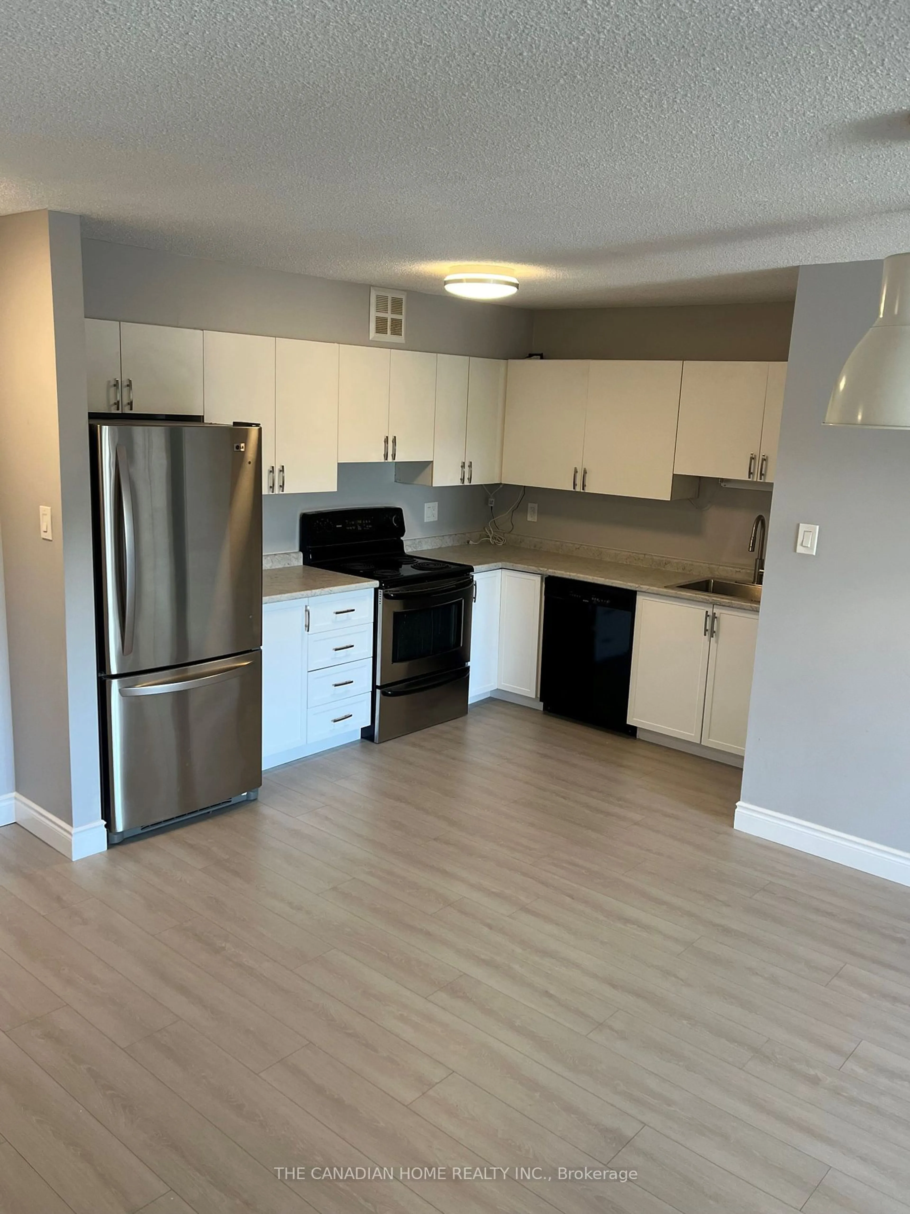 Open concept kitchen, wood/laminate floor for 15 HOFSTETTER Ave #412, Kitchener Ontario N2A 3Z7