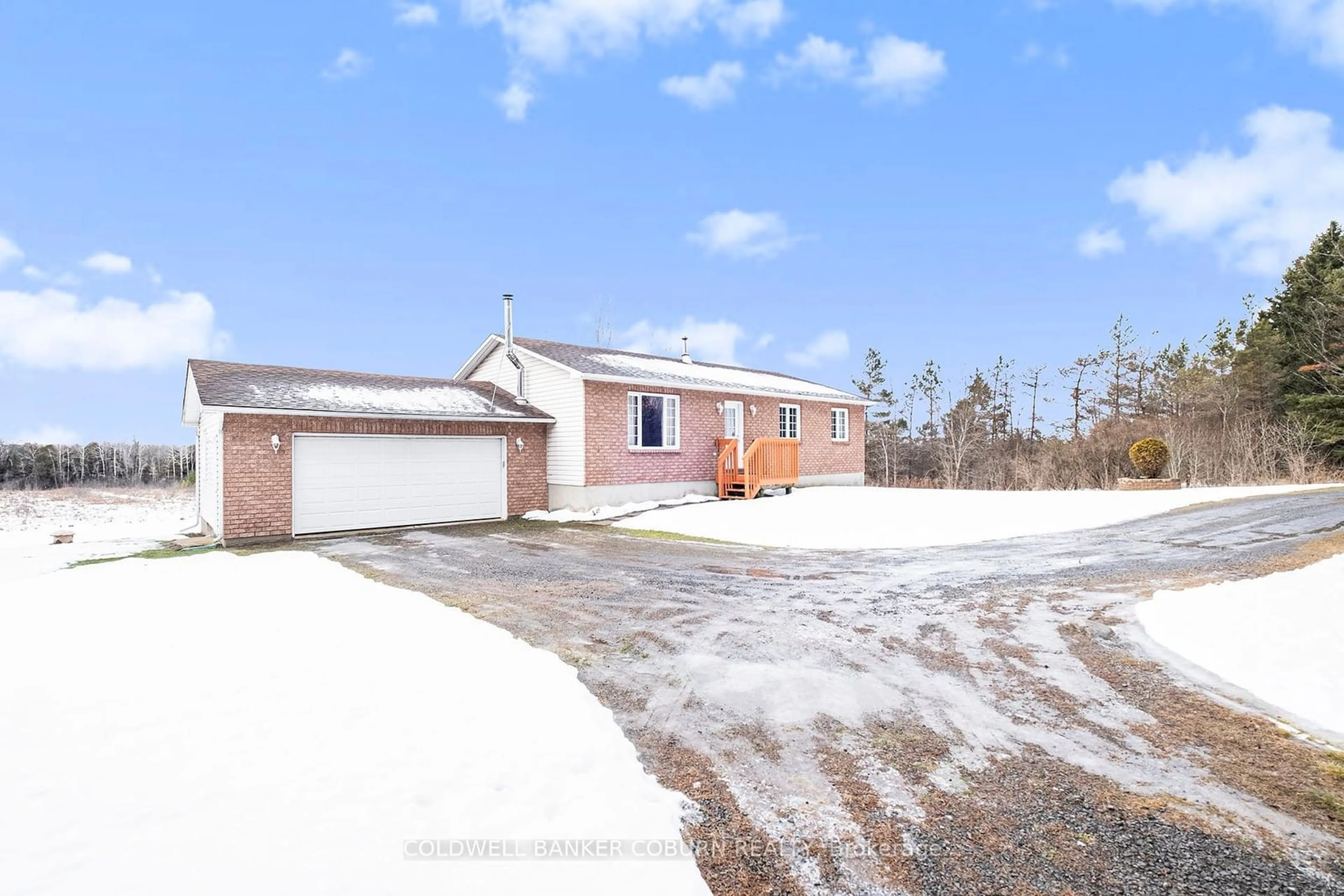 A pic from outside/outdoor area/front of a property/back of a property/a pic from drone, street for 760 Rock Rd, North Grenville Ontario K0G 1J0