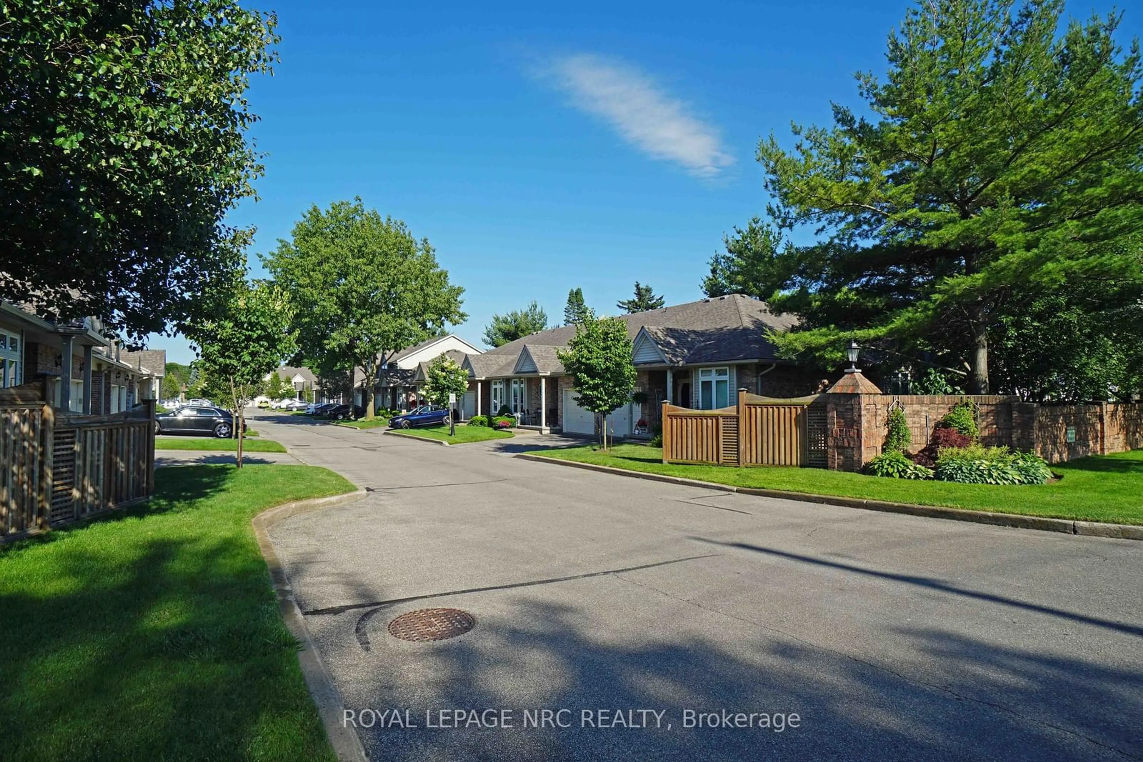 A pic from outside/outdoor area/front of a property/back of a property/a pic from drone, street for 5070 drummond Rd #28, Niagara Falls Ontario L2E 6E4