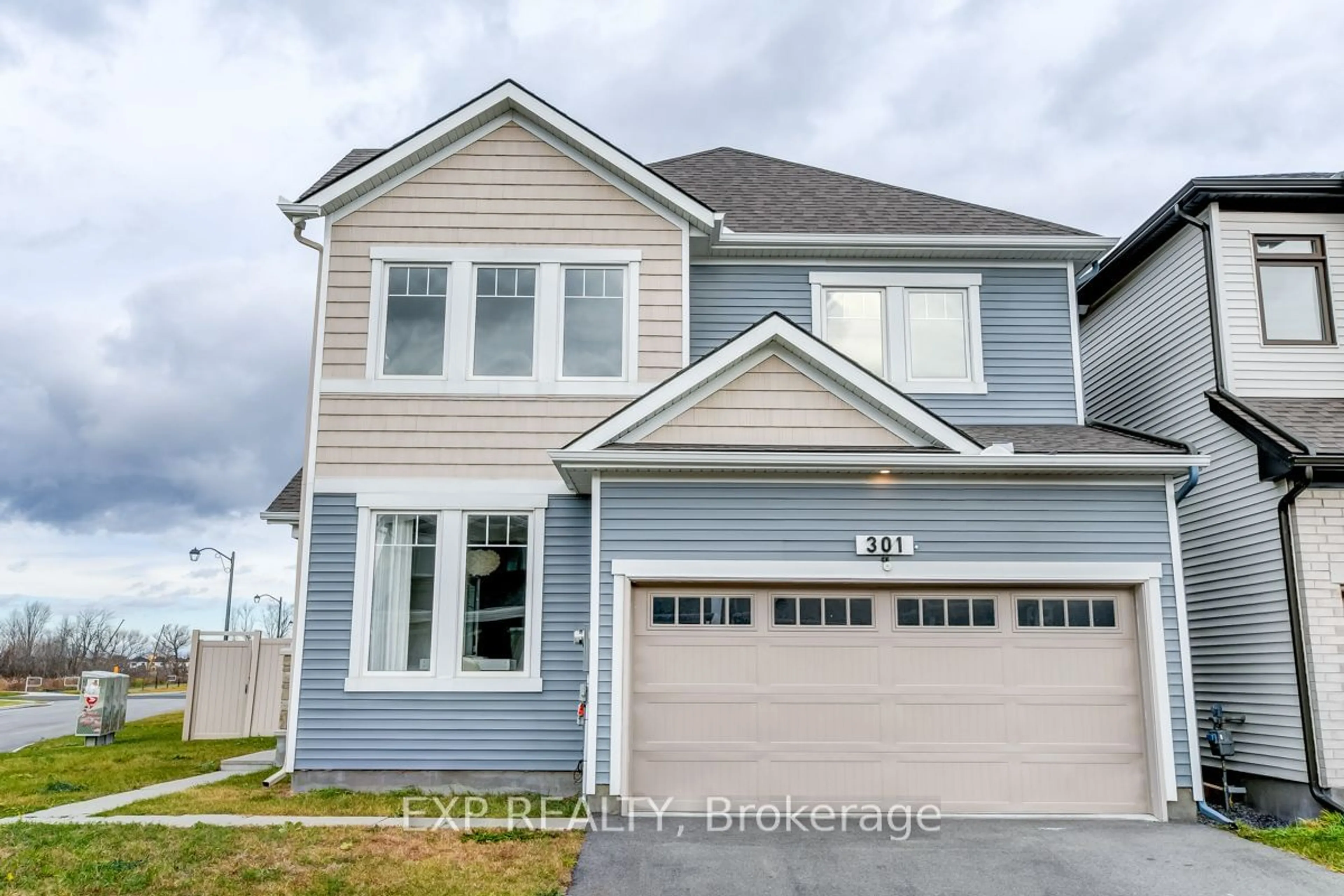 Home with vinyl exterior material, street for 301 PROXIMA Terr, Barrhaven Ontario K2J 6T1