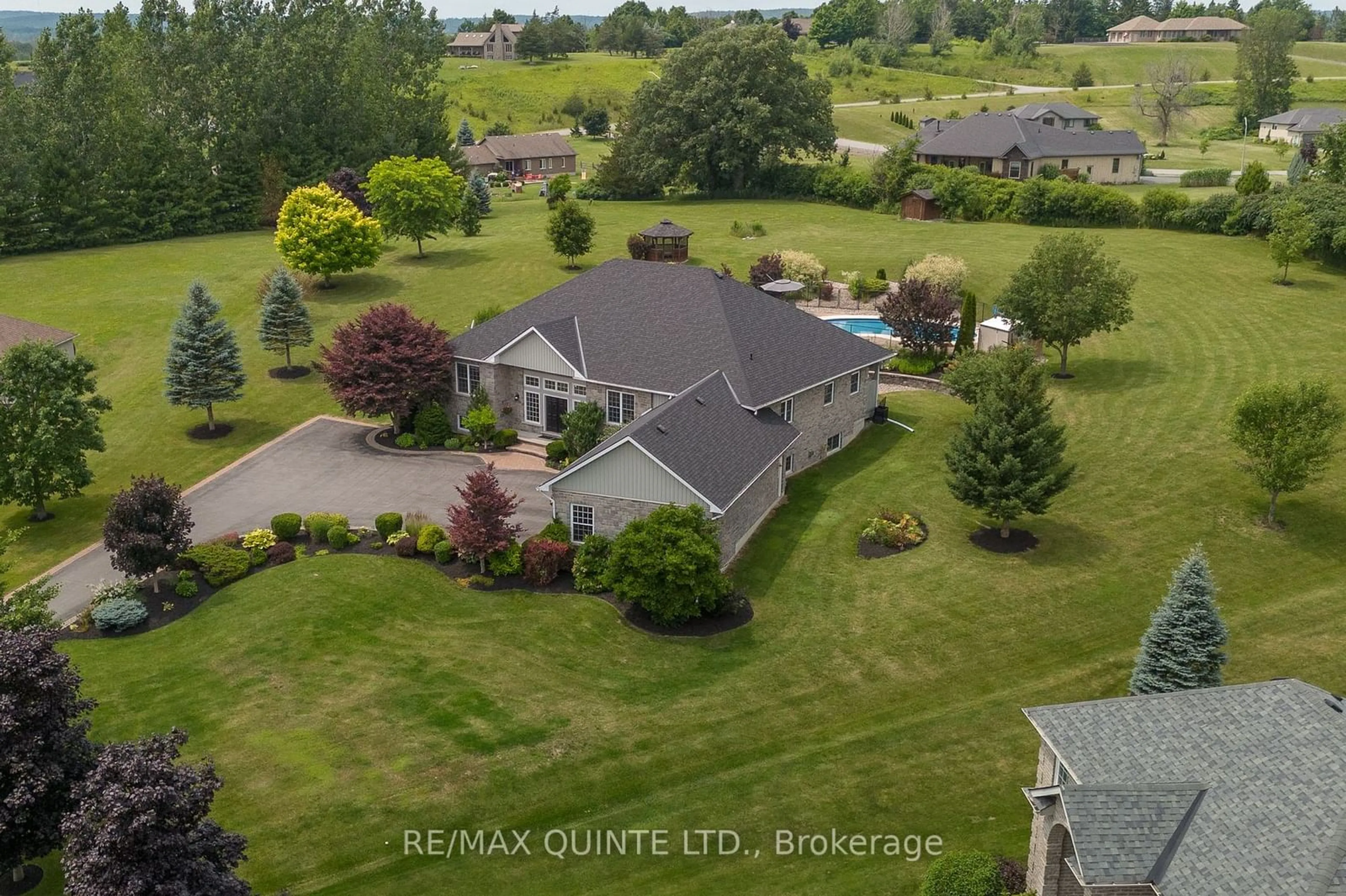 A pic from outside/outdoor area/front of a property/back of a property/a pic from drone, water/lake/river/ocean view for 107 Country Charm Dr, Belleville Ontario K0K 2V0