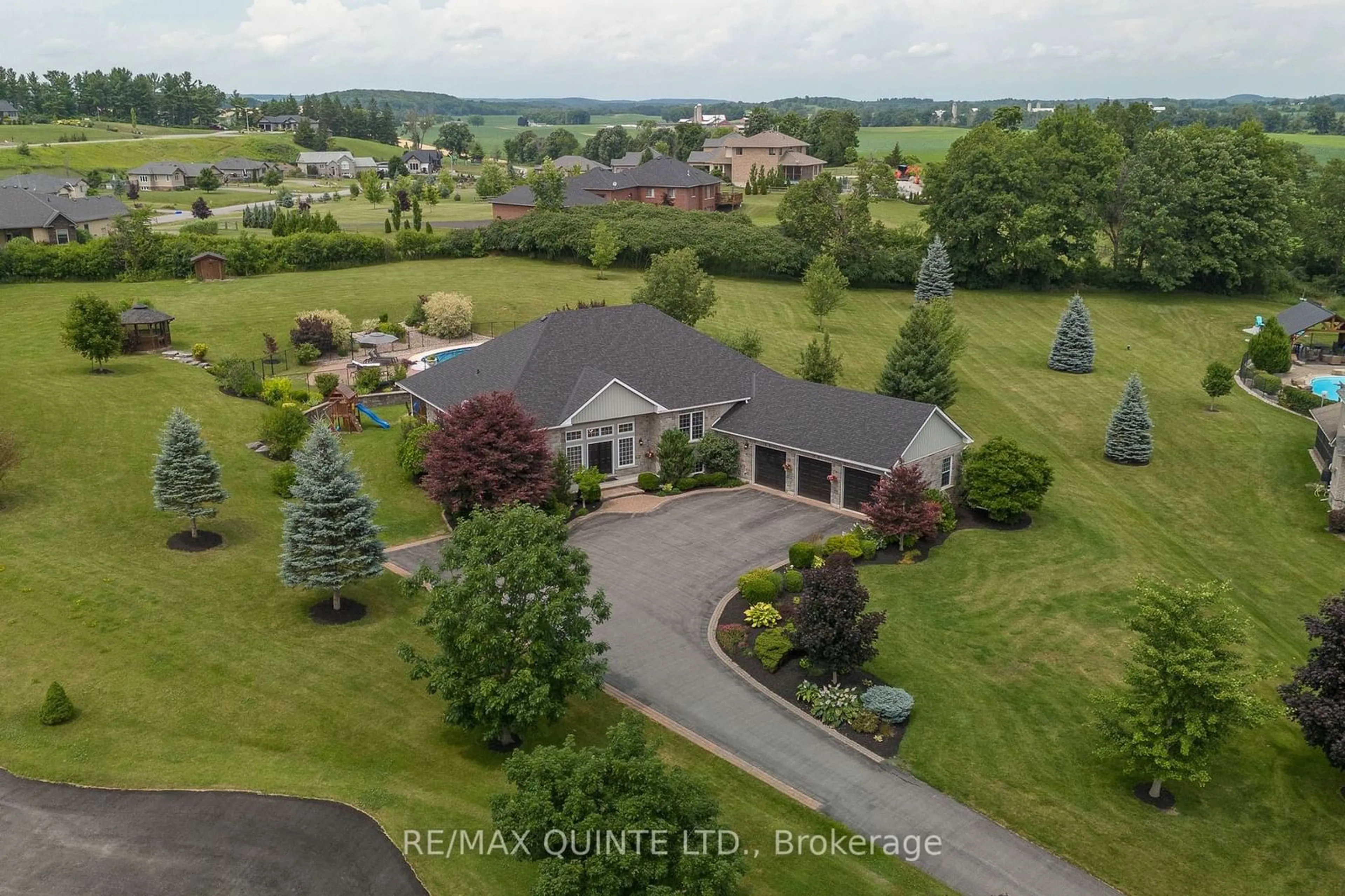 A pic from outside/outdoor area/front of a property/back of a property/a pic from drone, water/lake/river/ocean view for 107 Country Charm Dr, Belleville Ontario K0K 2V0