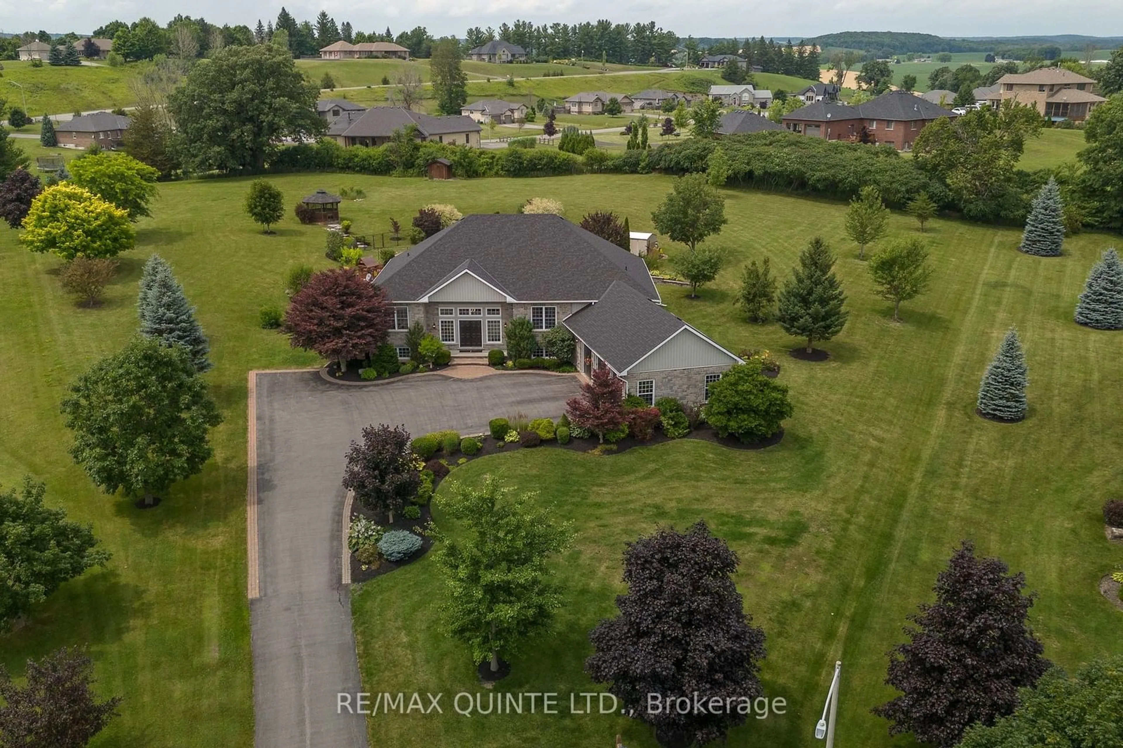 A pic from outside/outdoor area/front of a property/back of a property/a pic from drone, water/lake/river/ocean view for 107 Country Charm Dr, Belleville Ontario K0K 2V0