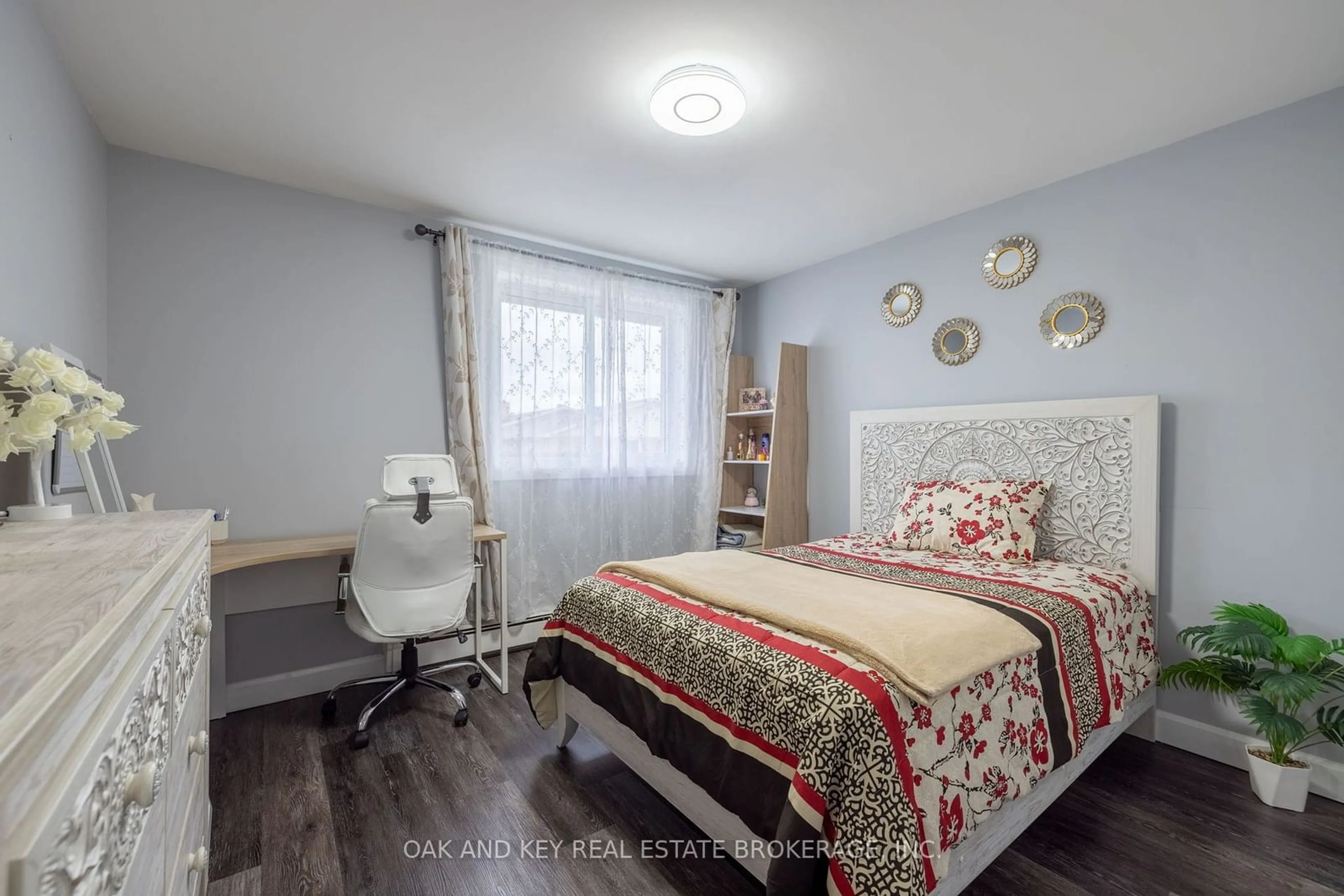 Bedroom with bed, wood/laminate floor for 1590 Ernest Ave #301, London Ontario N6E 2V4