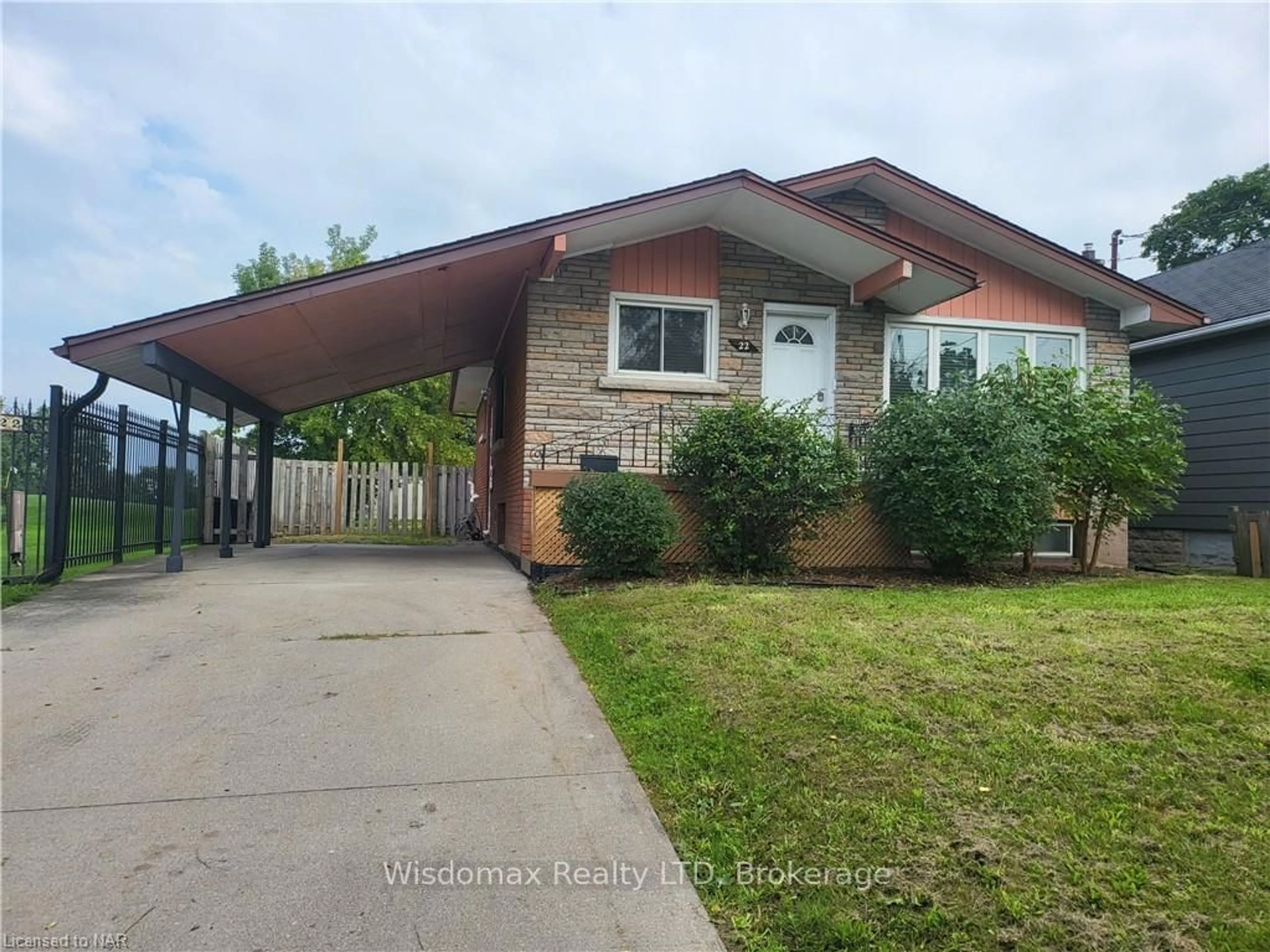 Home with brick exterior material, street for 22 Willowdale Ave, St. Catharines Ontario L2R 4K6