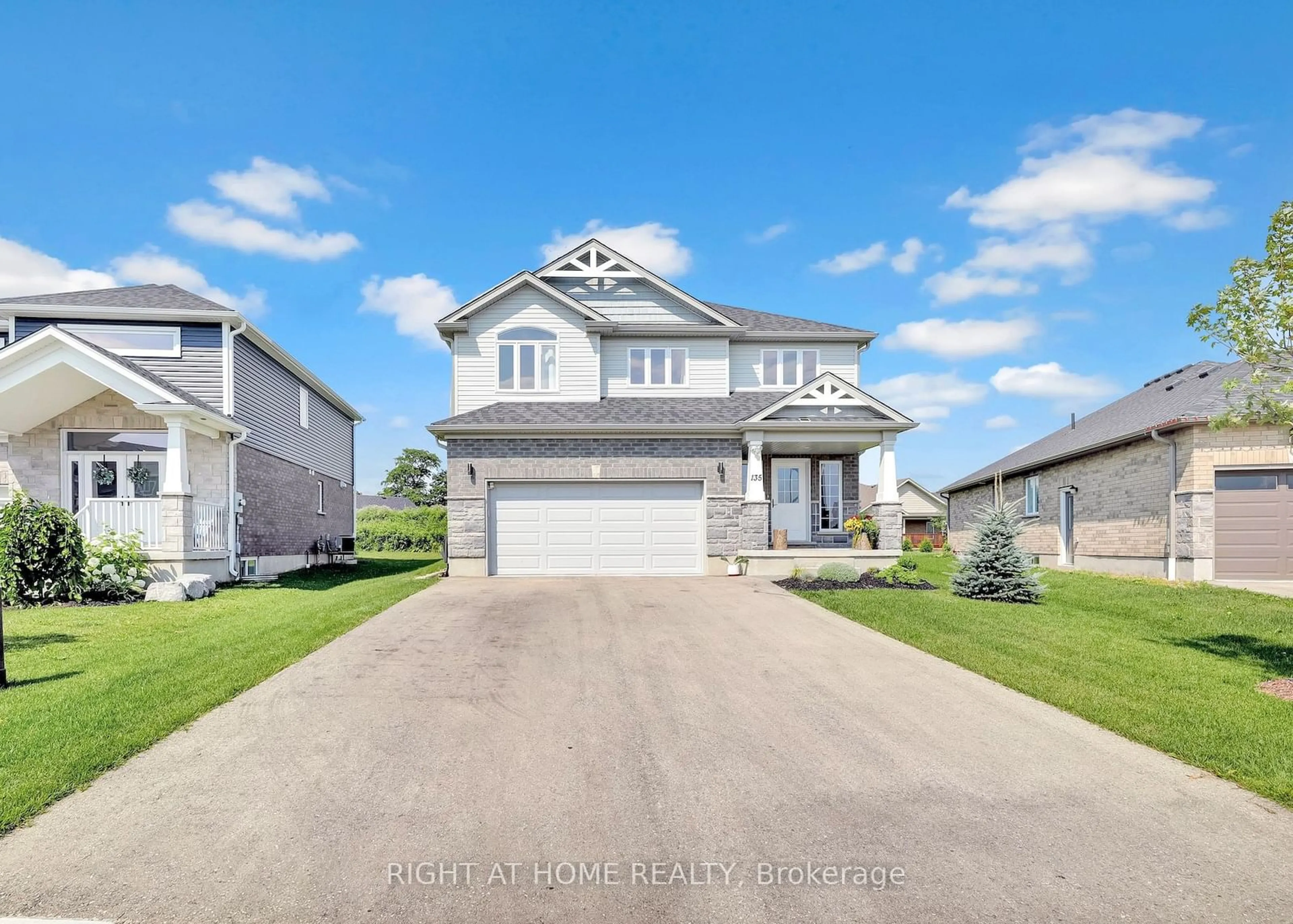 A pic from outside/outdoor area/front of a property/back of a property/a pic from drone, street for 135 Stephenson Way, Minto Ontario N0G 2P0