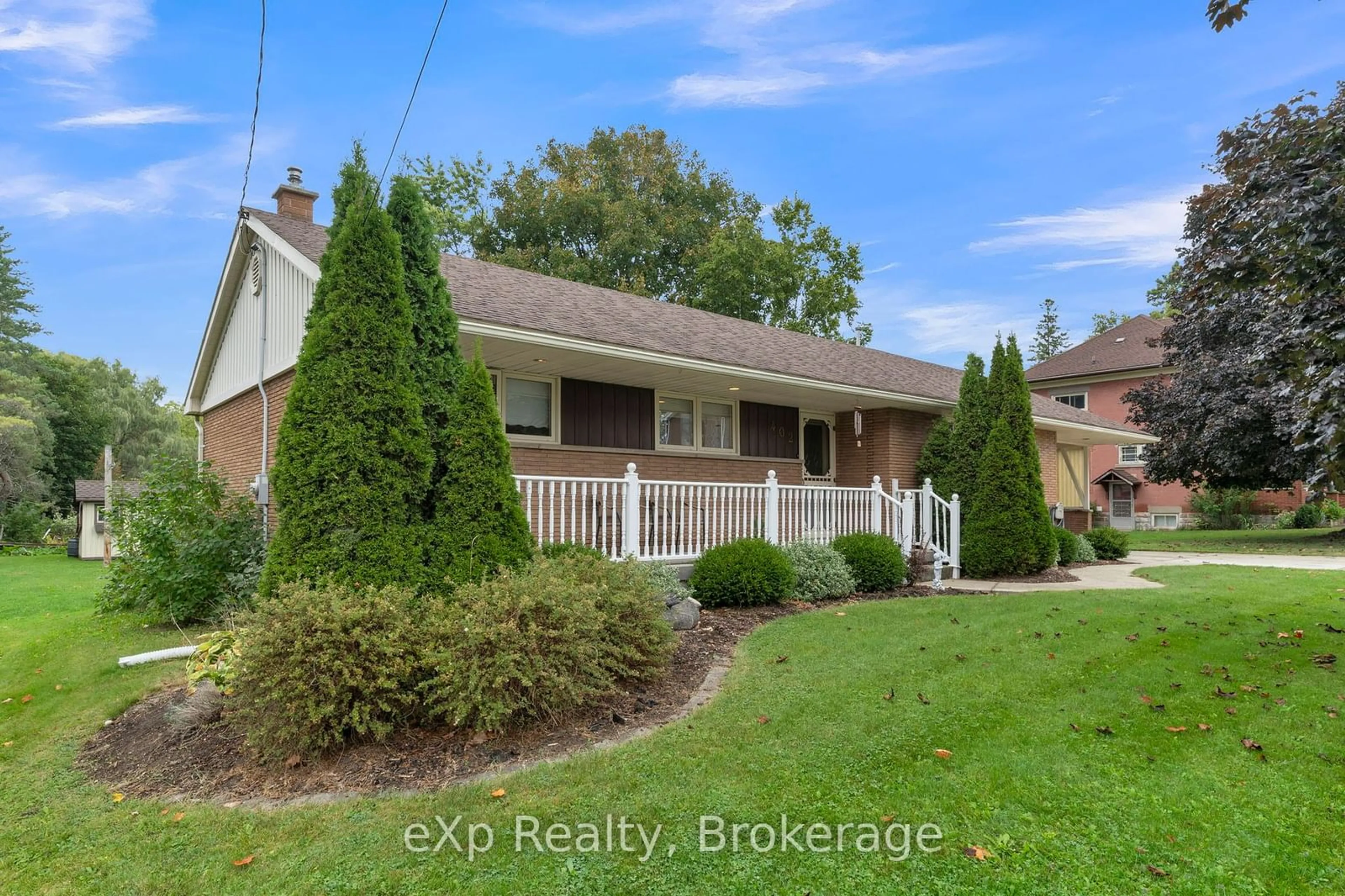 A pic from outside/outdoor area/front of a property/back of a property/a pic from drone, street for 402 Mary St, West Grey Ontario N0G 1C0