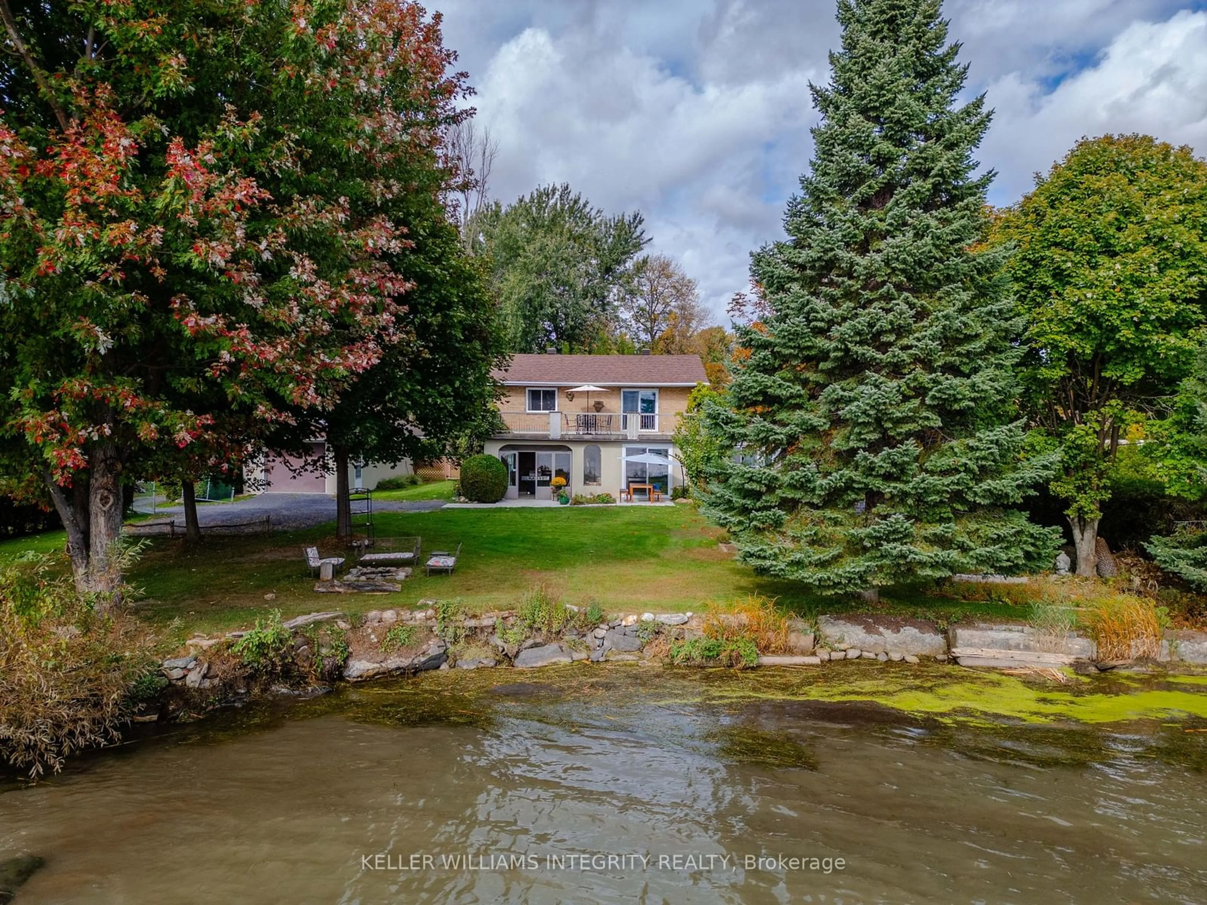 A pic from outside/outdoor area/front of a property/back of a property/a pic from drone, water/lake/river/ocean view for 6279 151st Ave-Gunn Cres, South Glengarry Ontario K0C 1E0