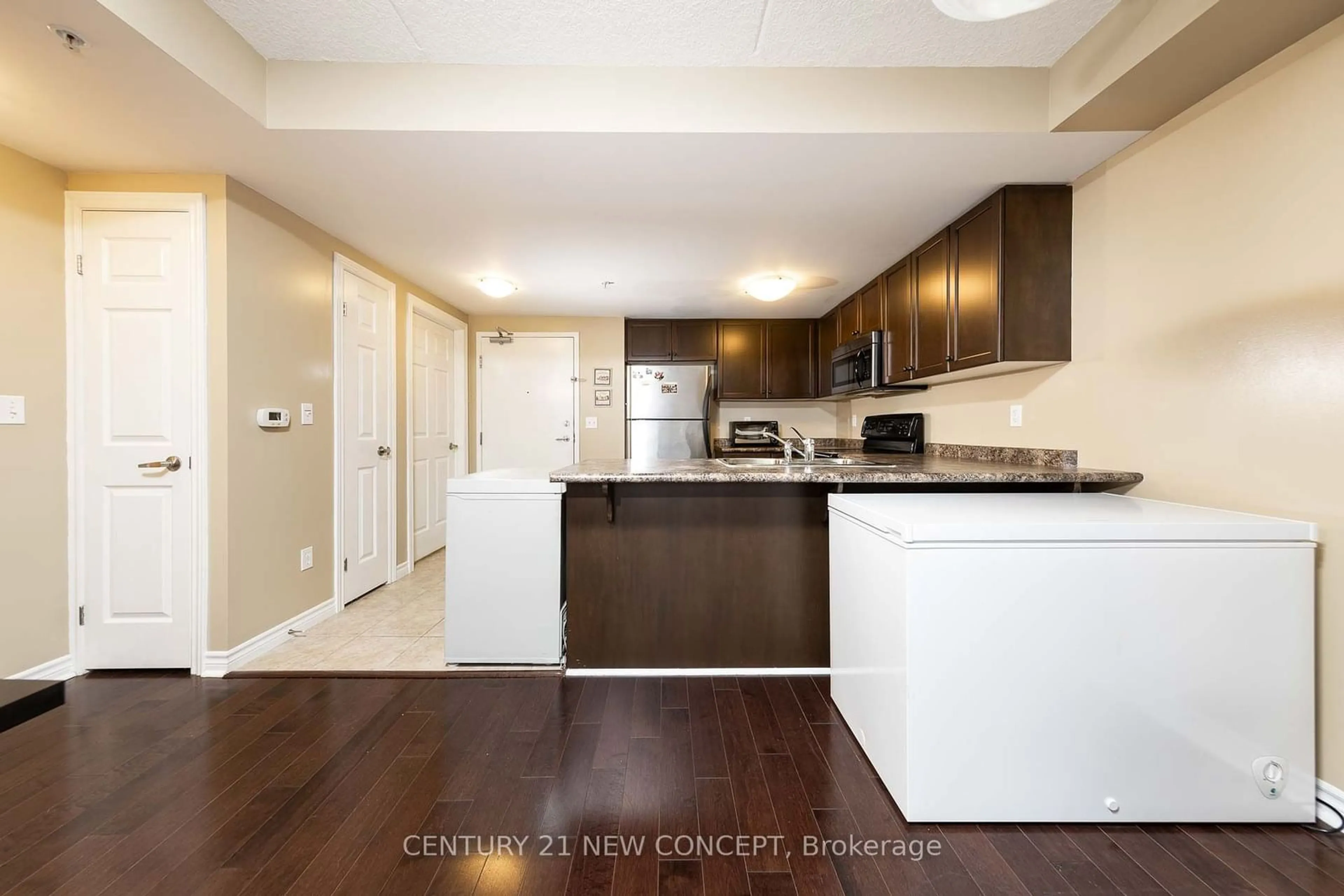 Open concept kitchen, unknown for 41 Goodwin Dr #109, Guelph Ontario N1L 0E7