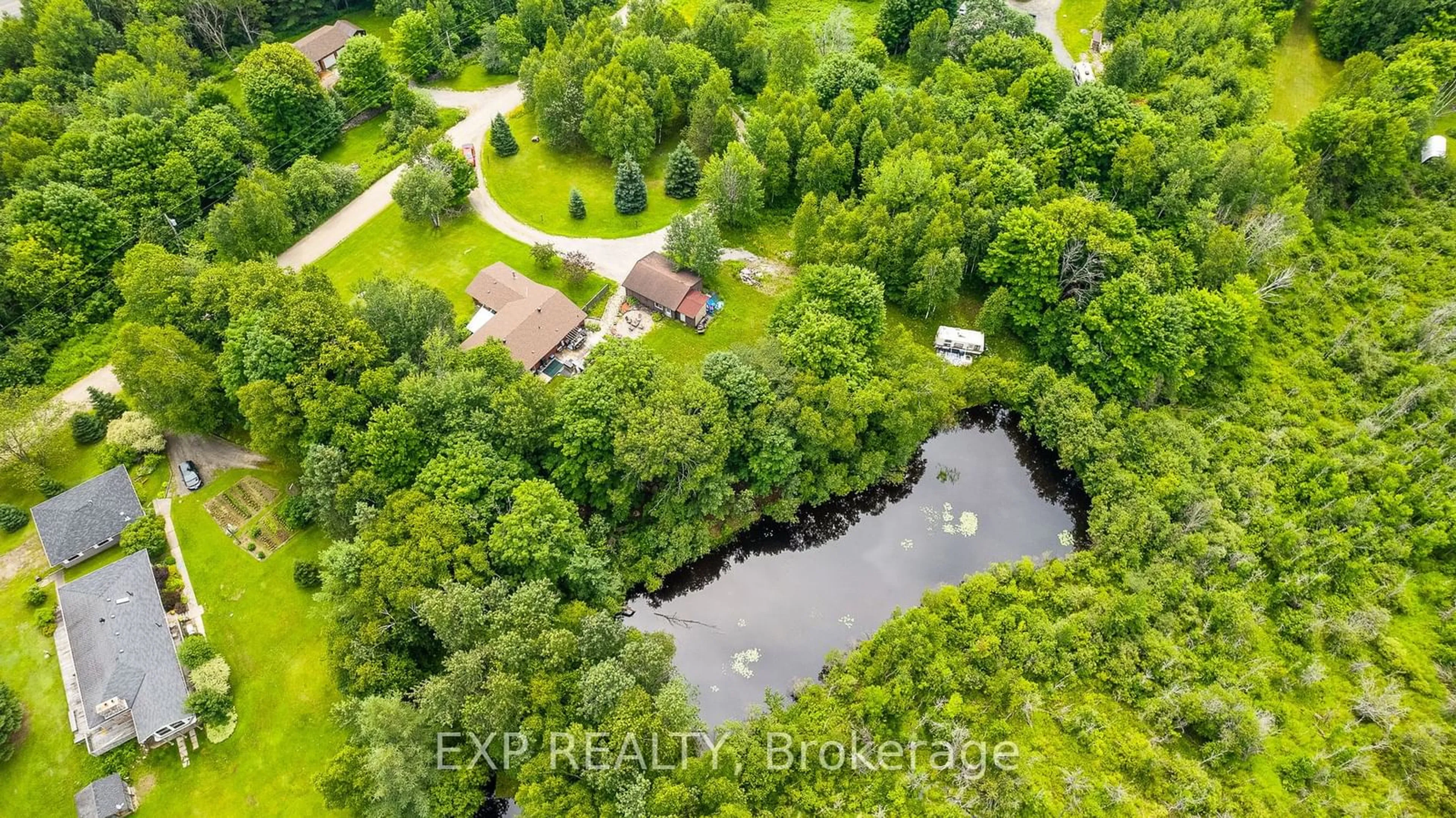 A pic from outside/outdoor area/front of a property/back of a property/a pic from drone, water/lake/river/ocean view for 1037 Kernohan Farm Tr, Minden Hills Ontario K0M 2K0