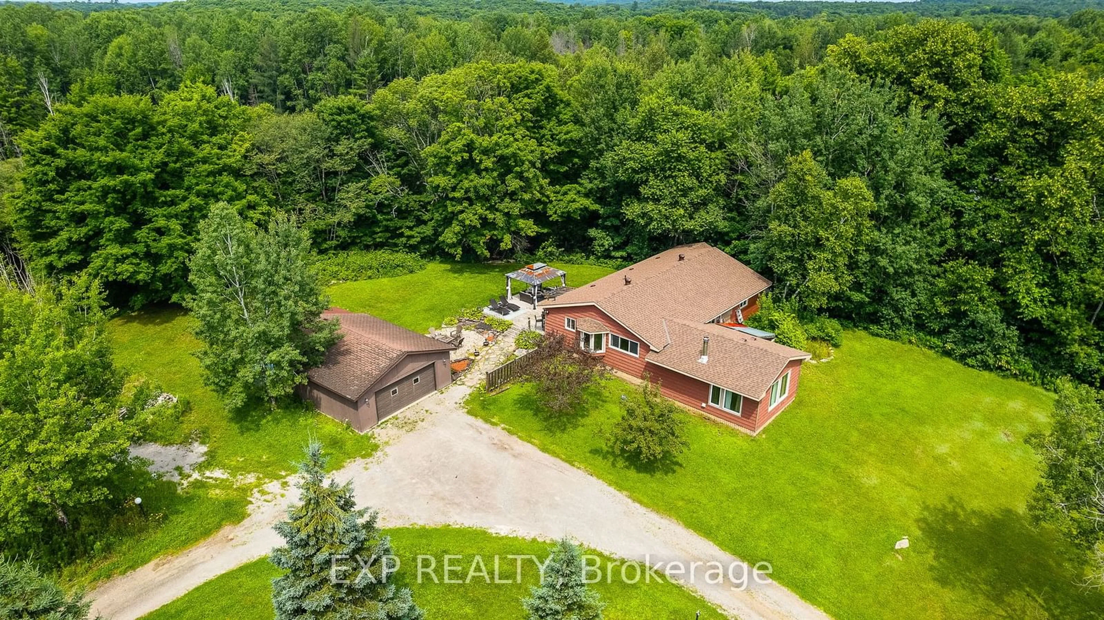 A pic from outside/outdoor area/front of a property/back of a property/a pic from drone, water/lake/river/ocean view for 1037 Kernohan Farm Tr, Minden Hills Ontario K0M 2K0