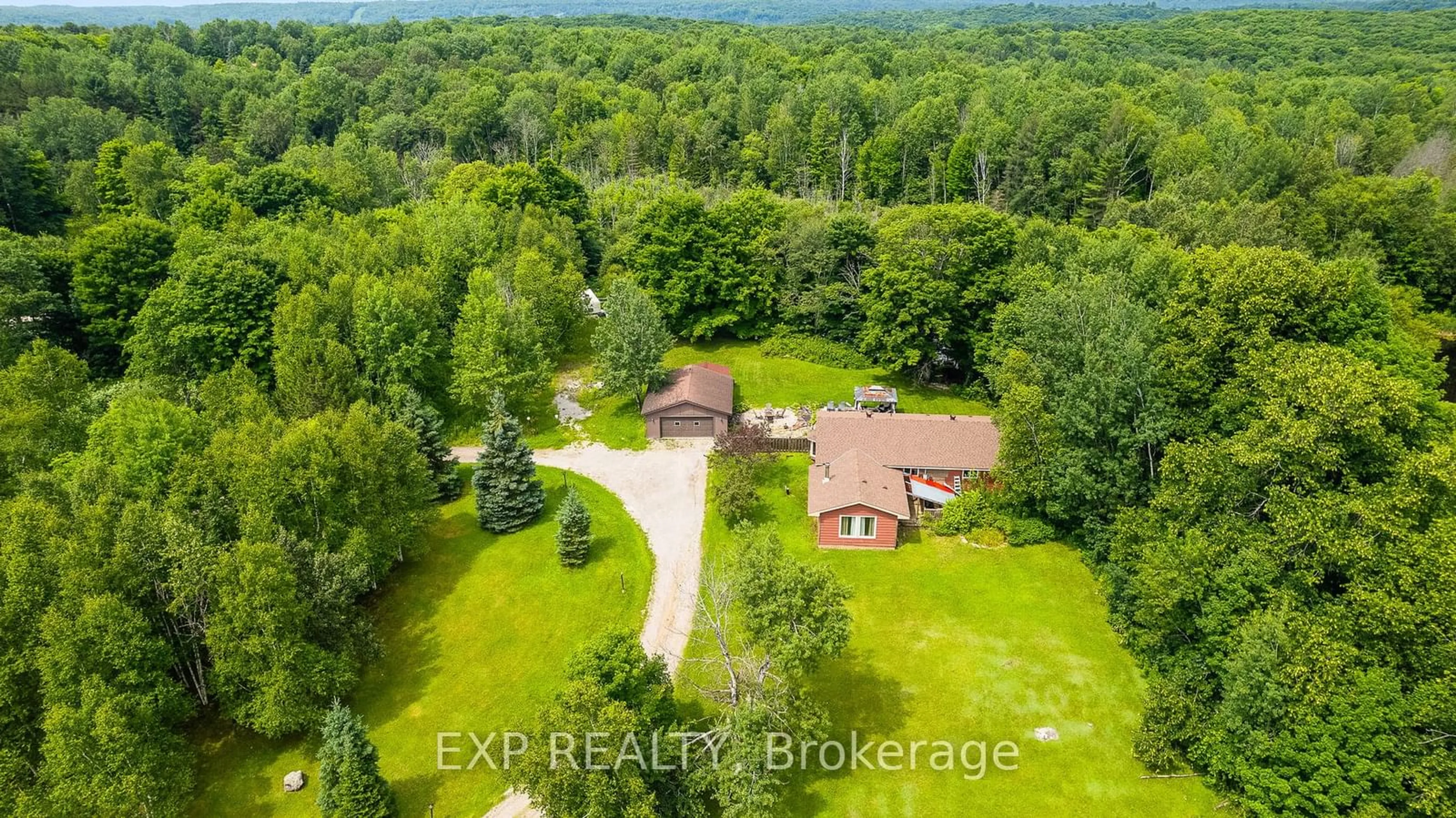 A pic from outside/outdoor area/front of a property/back of a property/a pic from drone, forest/trees view for 1037 Kernohan Farm Tr, Minden Hills Ontario K0M 2K0