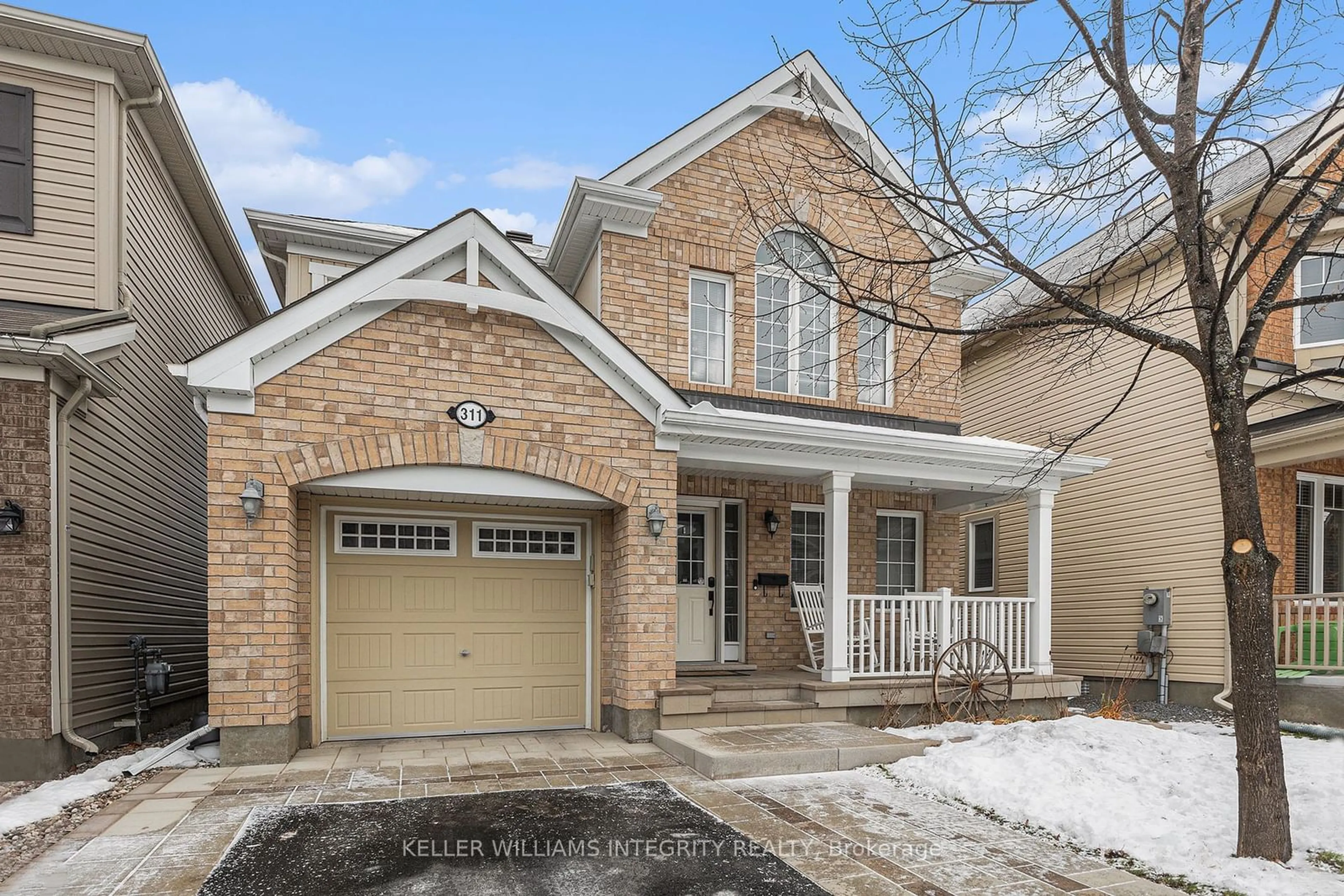 Home with brick exterior material, street for 311 Gallantry Way, Stittsville - Munster - Richmond Ontario K2S 0P8