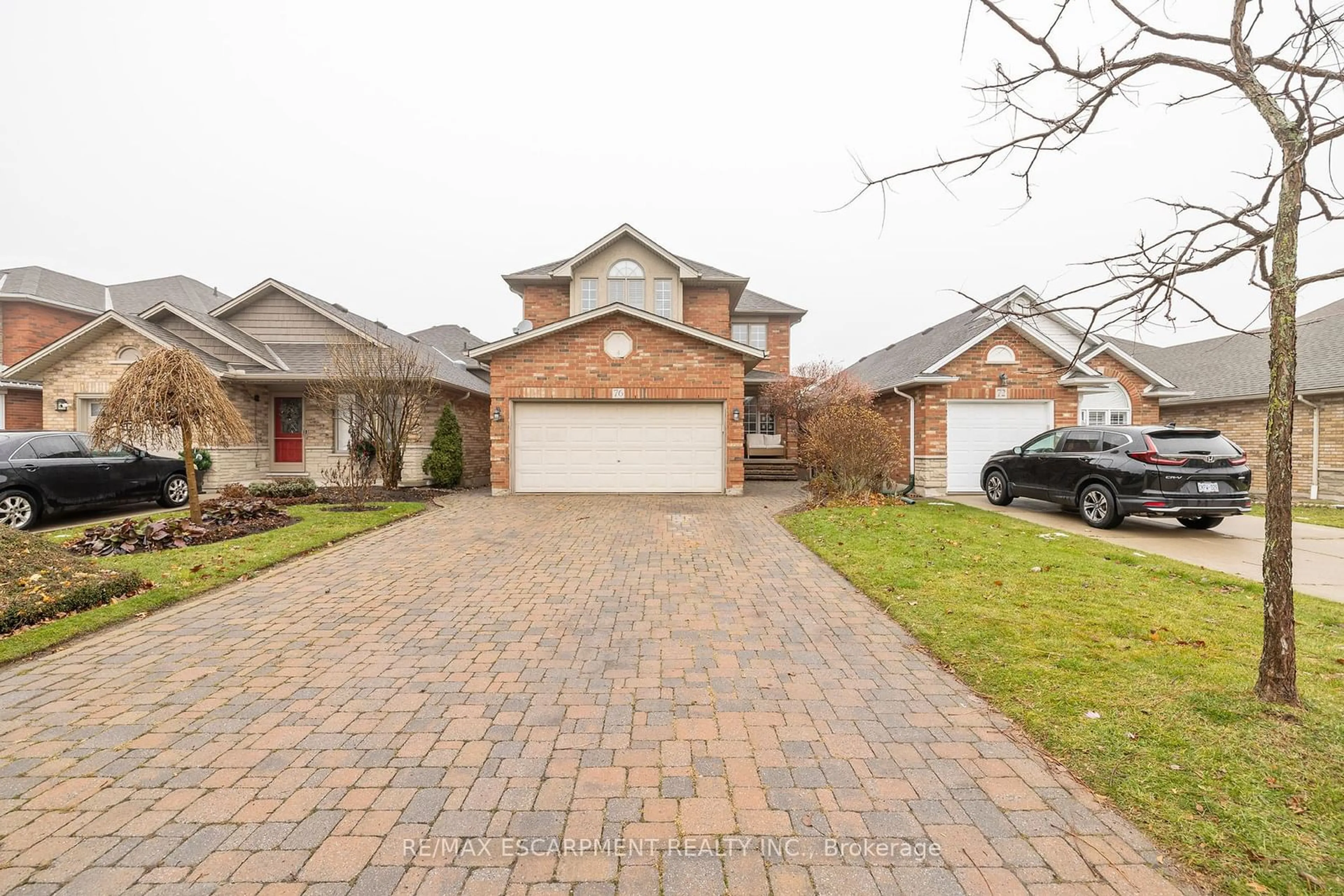 Home with brick exterior material, street for 76 Redfern Ave, Hamilton Ontario L9C 7S4