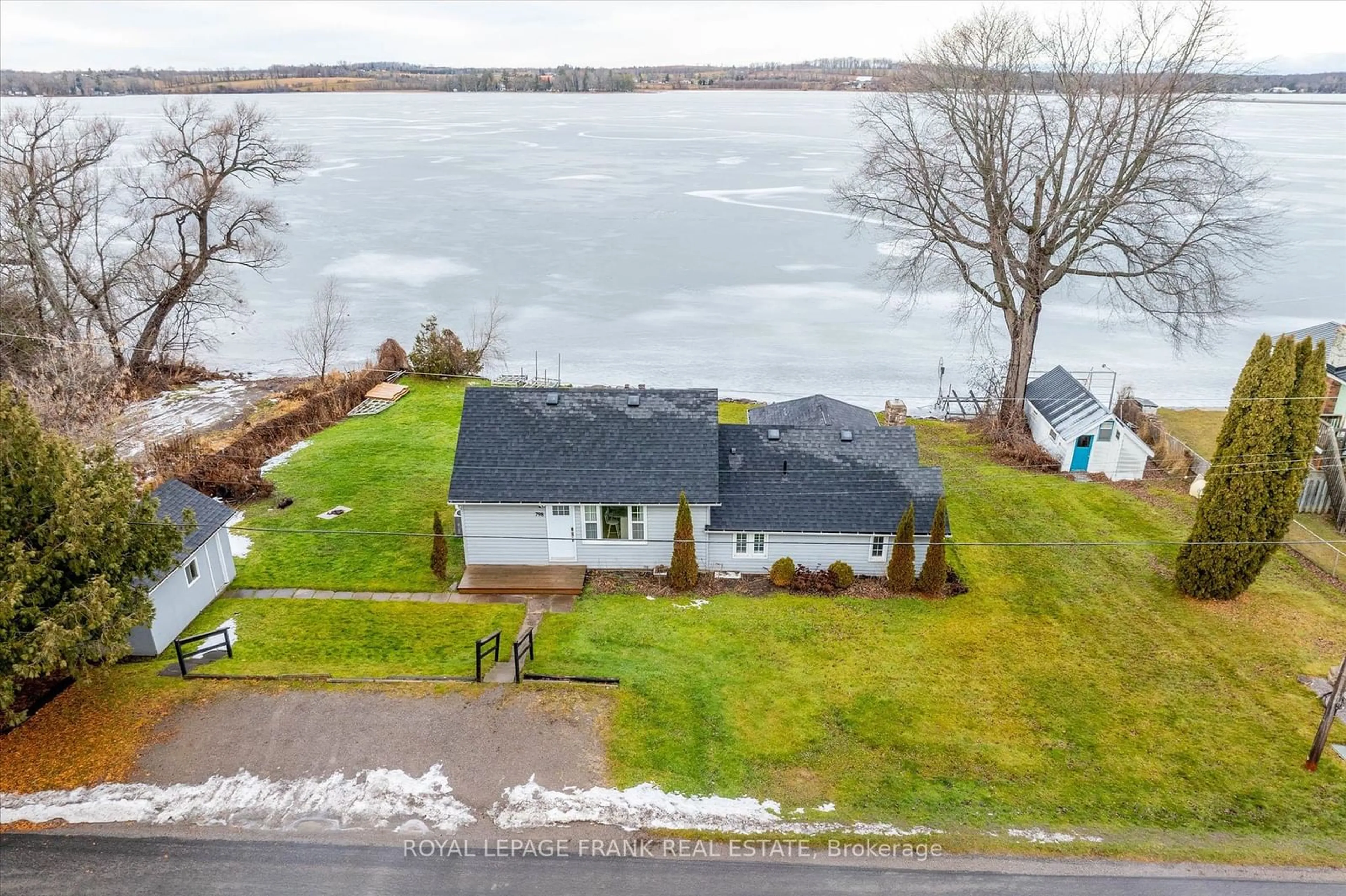 A pic from outside/outdoor area/front of a property/back of a property/a pic from drone, water/lake/river/ocean view for 798 Simcoe St, Smith-Ennismore-Lakefield Ontario K0L 1H0