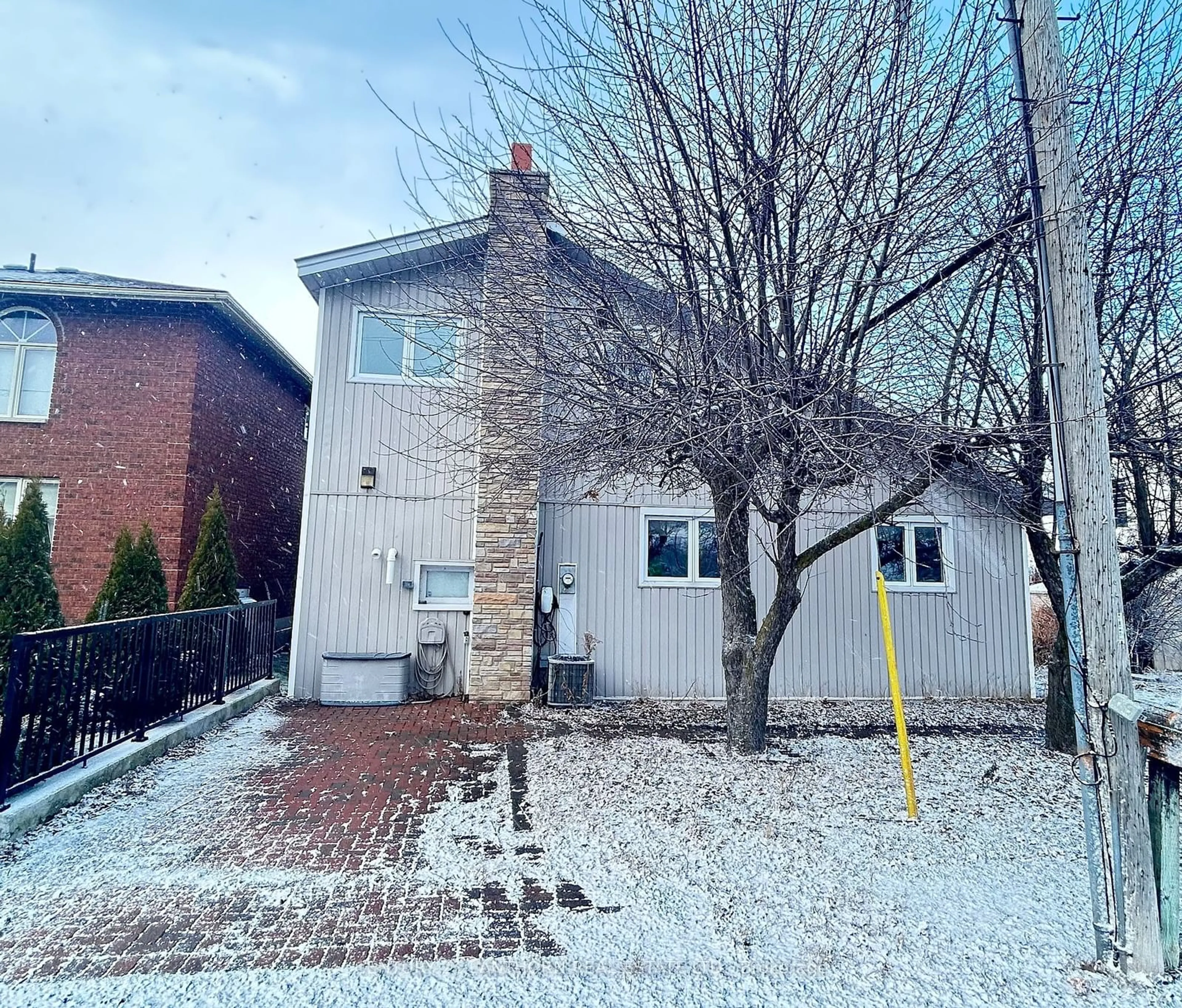 Home with brick exterior material, street for 20 Ridley St, Prince Edward County Ontario K8N 4Z1