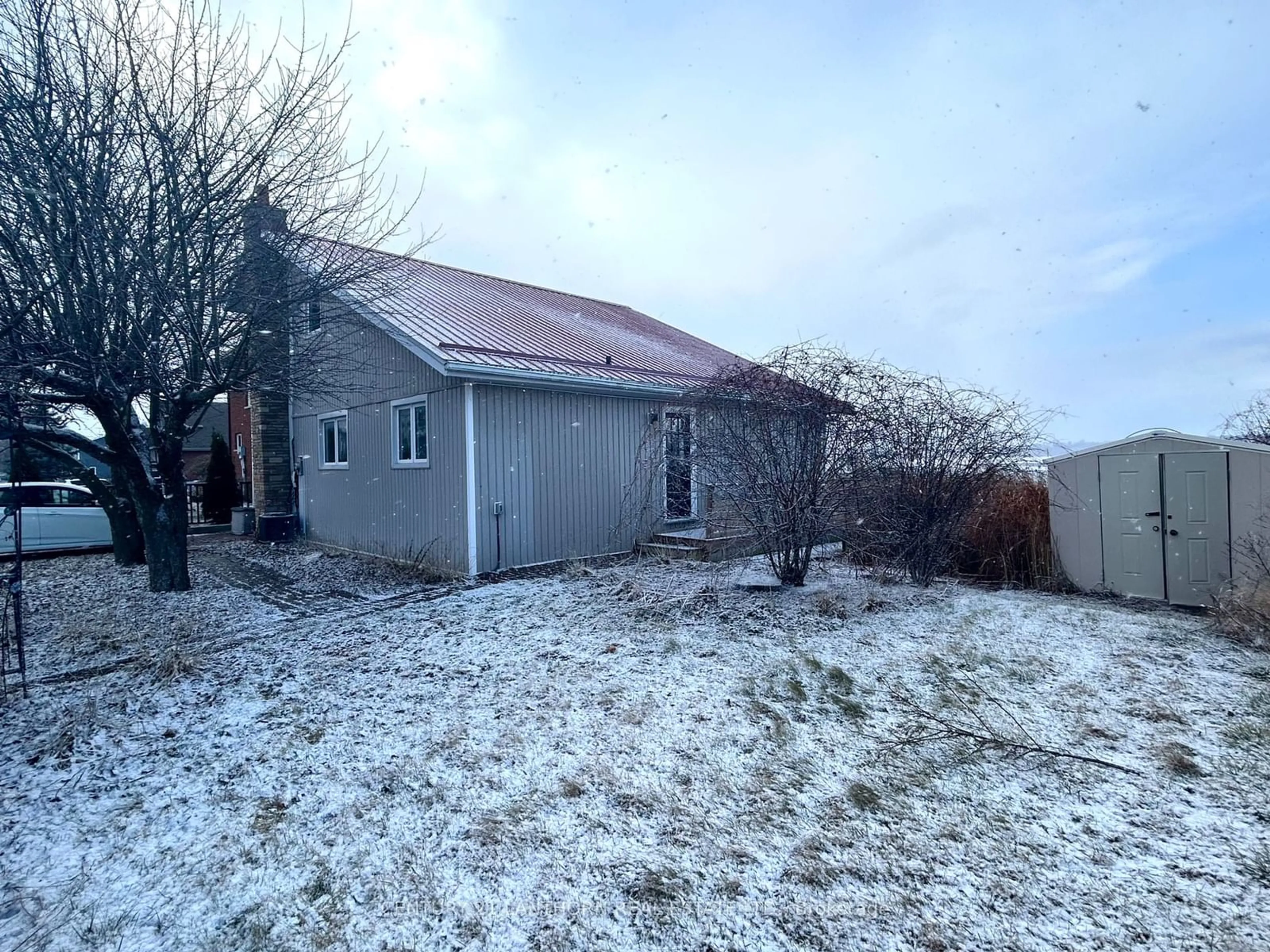 A pic from outside/outdoor area/front of a property/back of a property/a pic from drone, unknown for 20 Ridley St, Prince Edward County Ontario K8N 4Z1