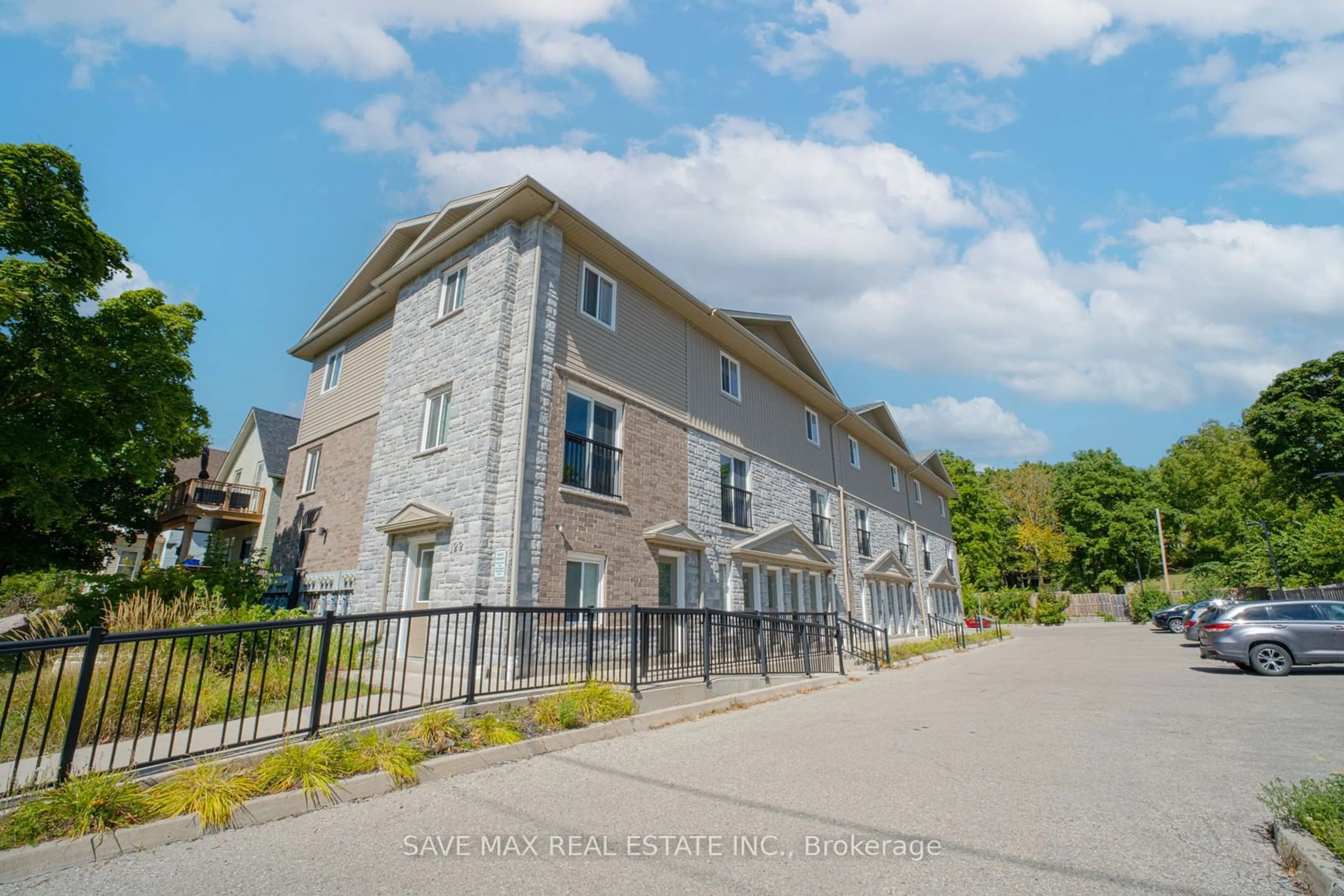 A pic from outside/outdoor area/front of a property/back of a property/a pic from drone, street for 122 Courtland Ave #3, Kitchener Ontario N2G 0B8