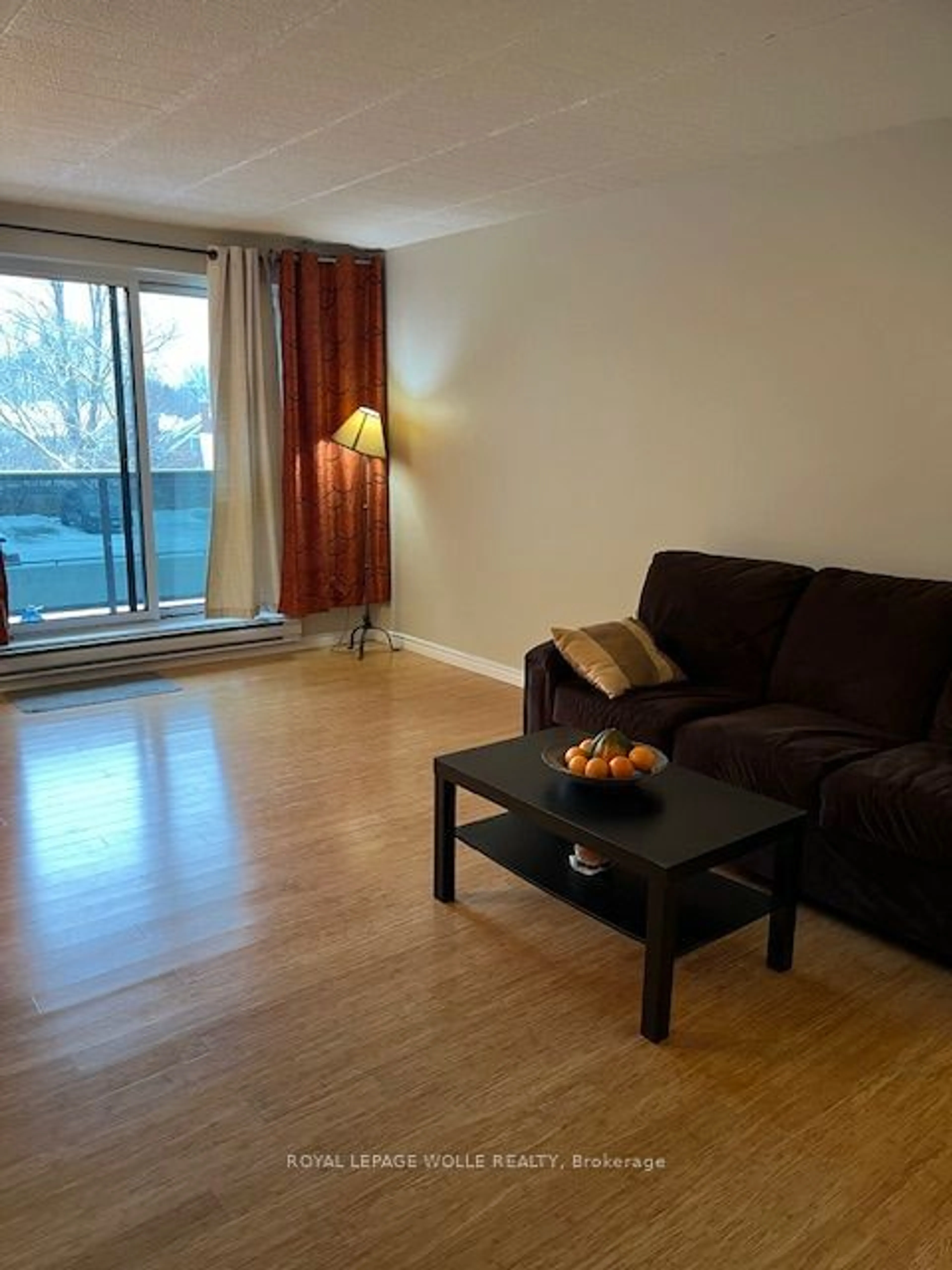 Living room with furniture, wood/laminate floor for 29 West Ave #201, Kitchener Ontario N2M 5E4