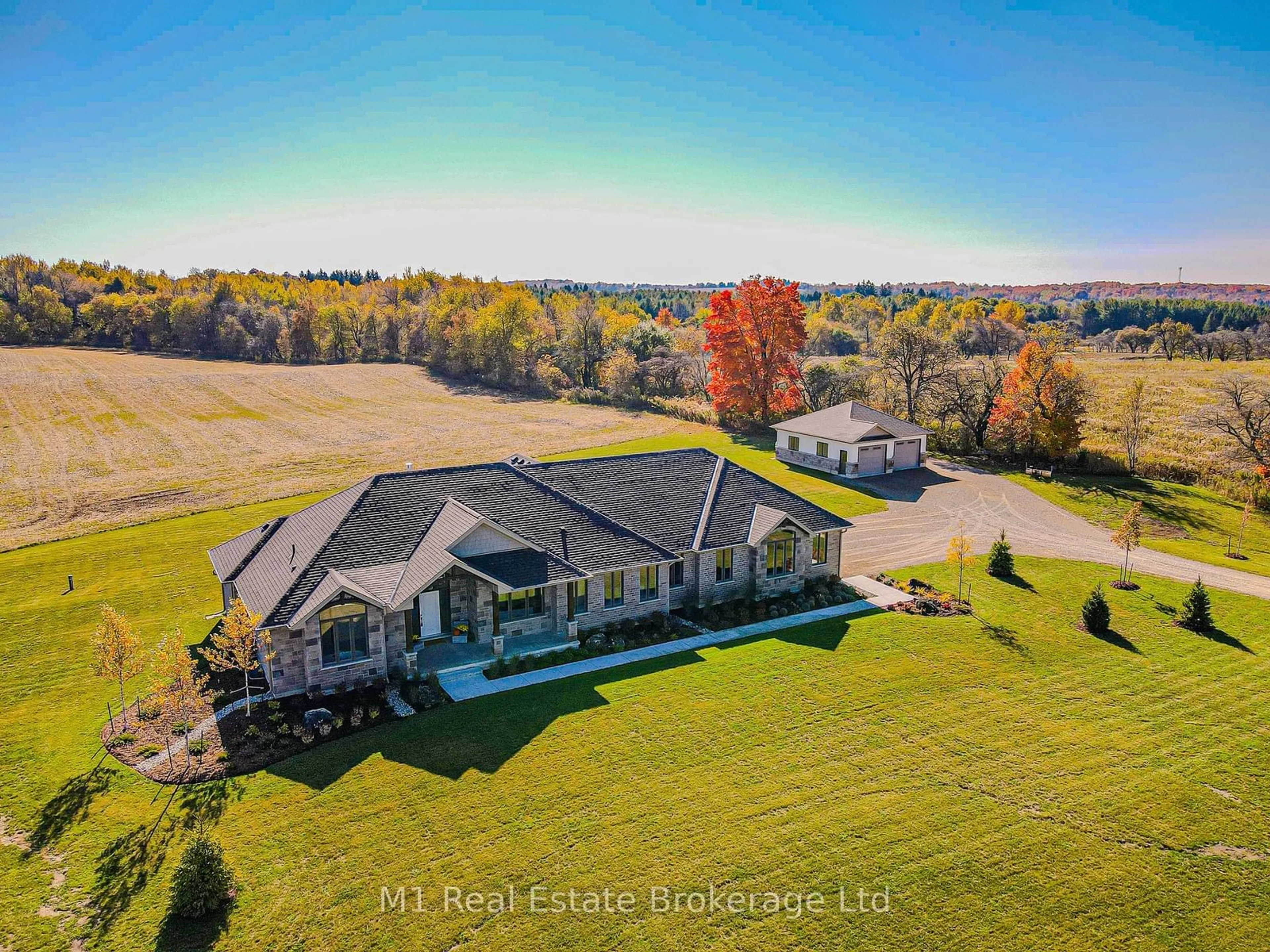 A pic from outside/outdoor area/front of a property/back of a property/a pic from drone, water/lake/river/ocean view for 101058 Side Road 10, East Garafraxa Ontario L9W 7J9