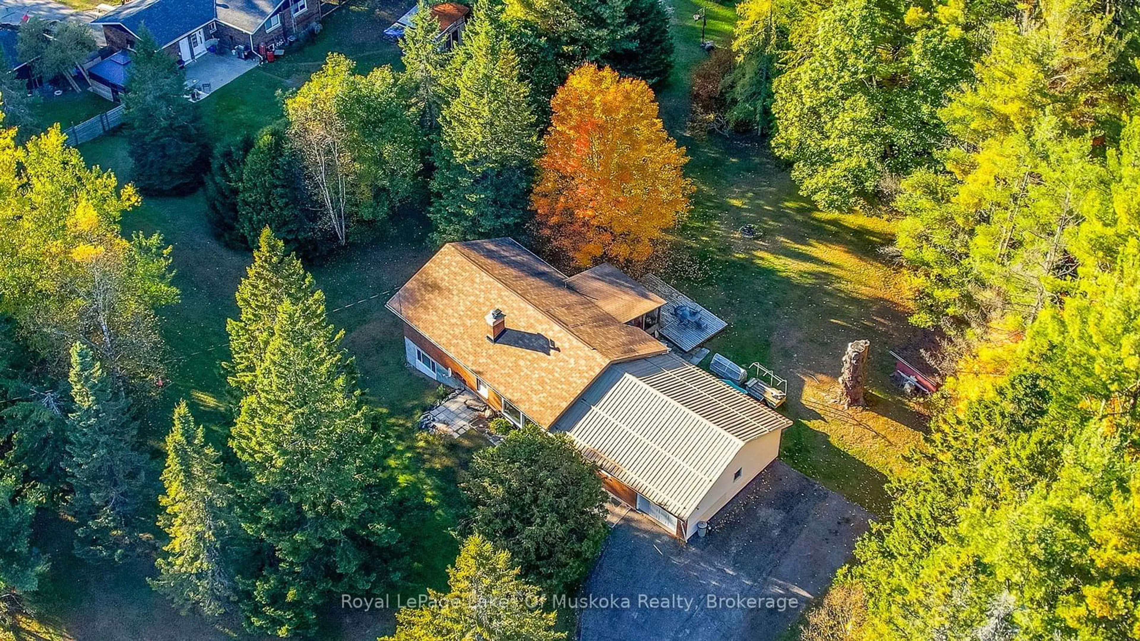 A pic from outside/outdoor area/front of a property/back of a property/a pic from drone, unknown for 1179 MUSKOKA ROAD 117, Bracebridge Ontario P1L 1W9