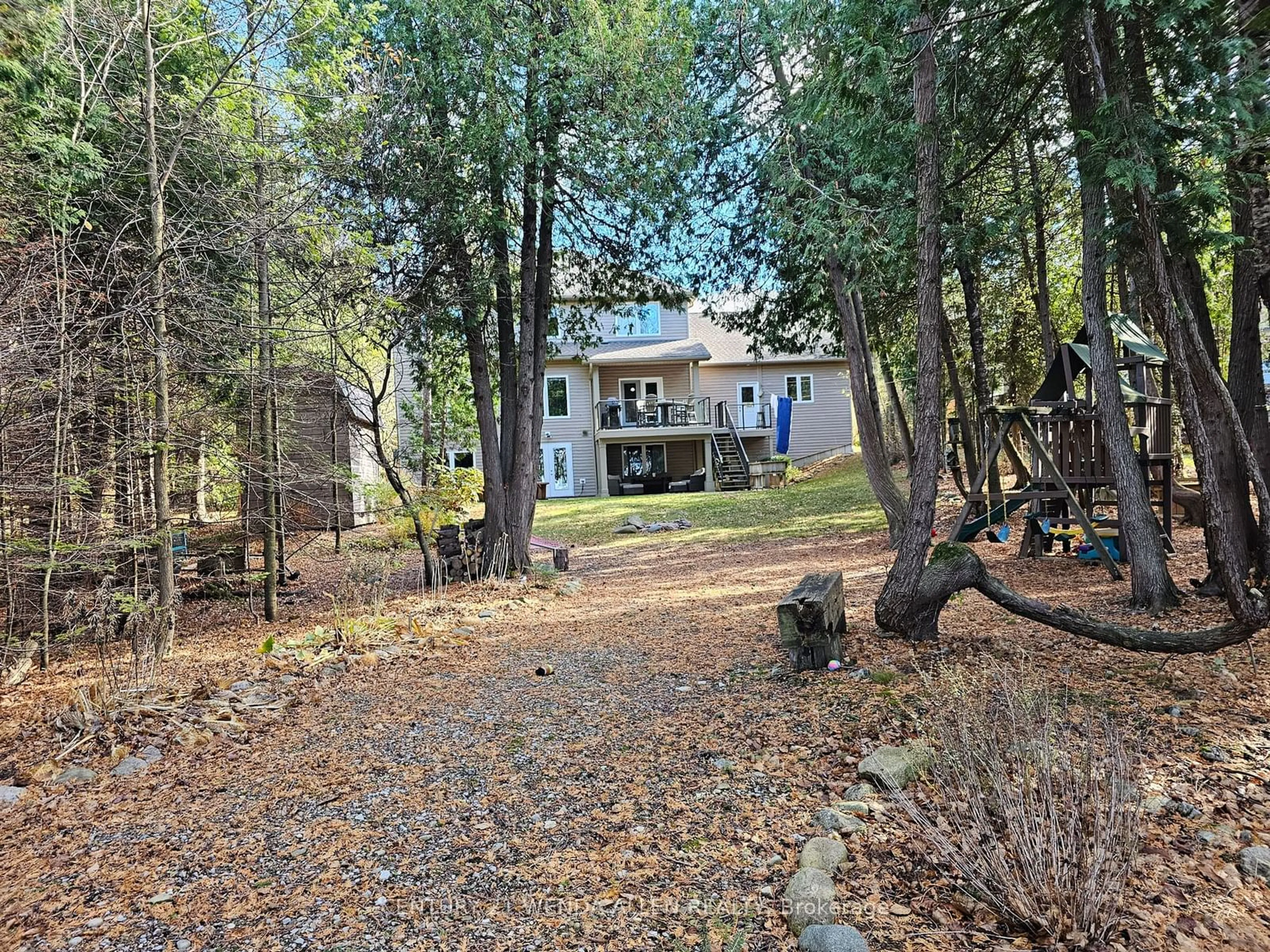 A pic from outside/outdoor area/front of a property/back of a property/a pic from drone, forest/trees view for 14 Kuehner St, Kincardine Ontario N0G 2T0