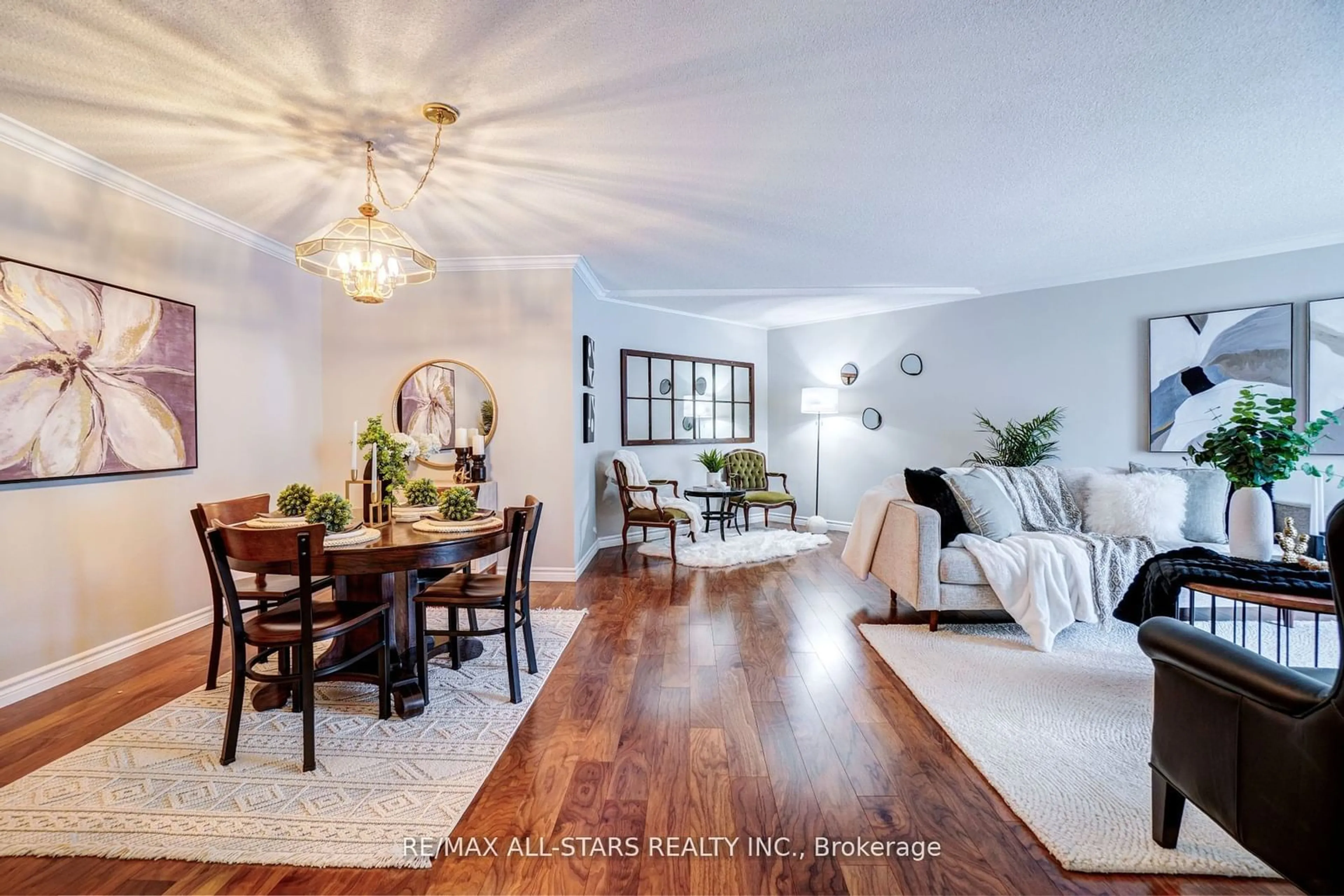 Living room with furniture, wood/laminate floor for 51 Rivermill Blvd #306, Kawartha Lakes Ontario K9V 6E8