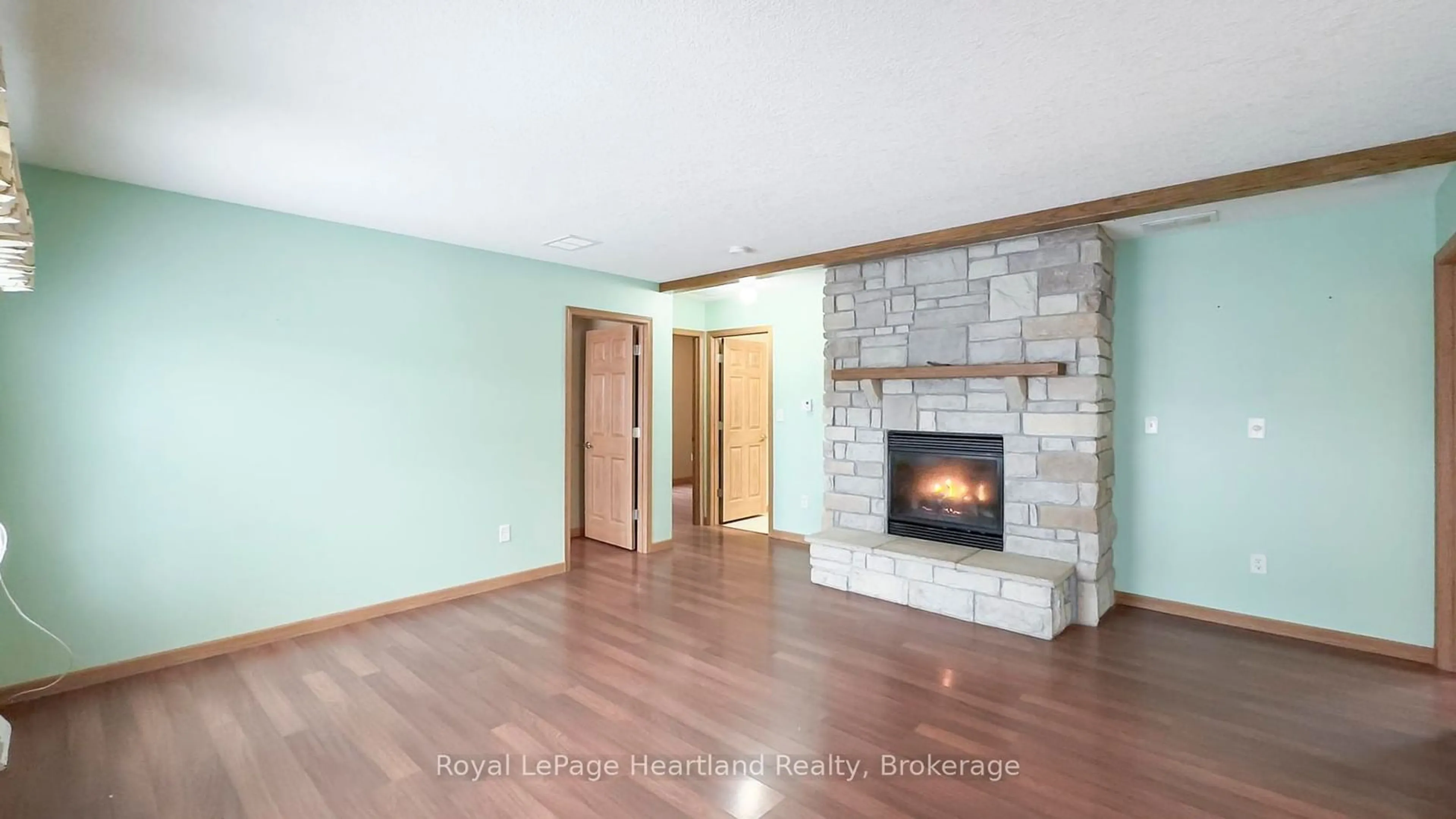 Living room with furniture, wood/laminate floor for 15 CHEYENNE Lane, Ashfield-Colborne-Wawanosh Ontario N7A 3Y2