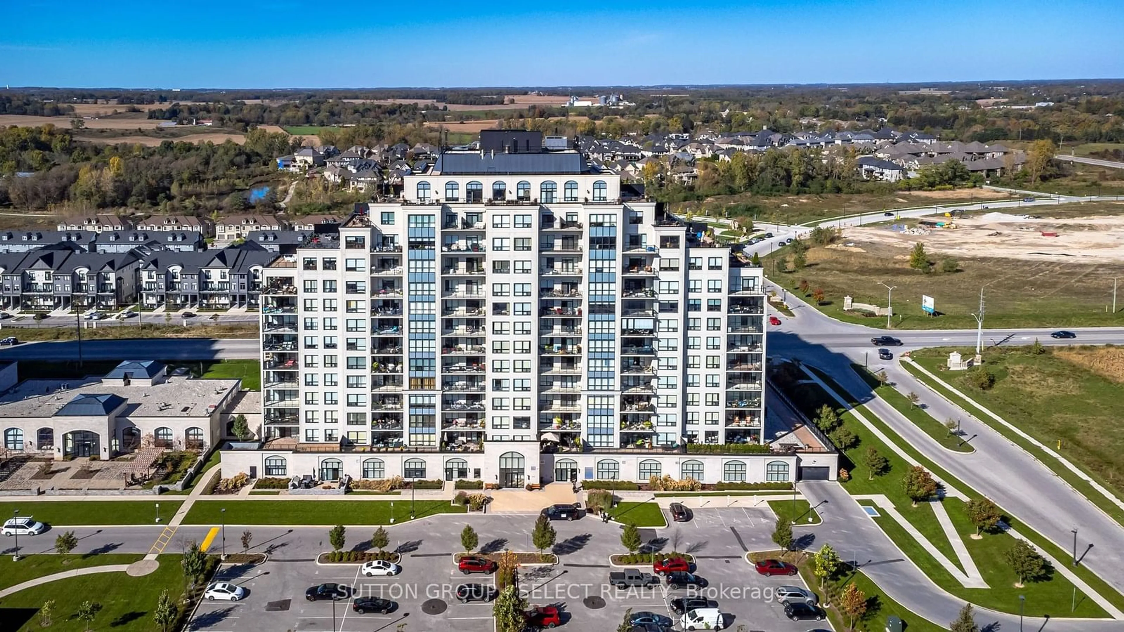 A pic from outside/outdoor area/front of a property/back of a property/a pic from drone, water/lake/river/ocean view for 240 Villagewalk Blvd #1110, London Ontario N6G 0P6