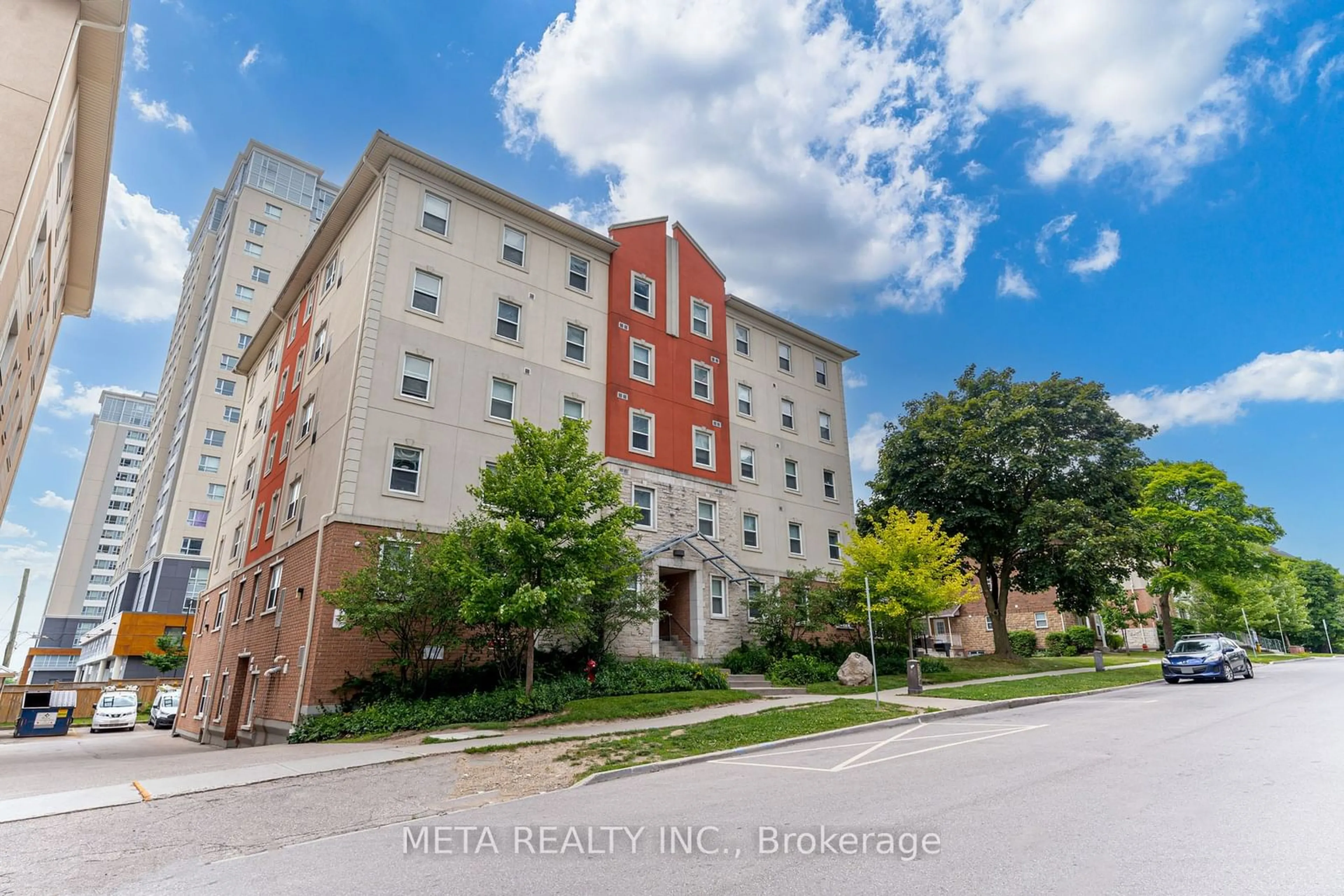 A pic from outside/outdoor area/front of a property/back of a property/a pic from drone, building for 253 Lester St #204, Waterloo Ontario N2L 3W6