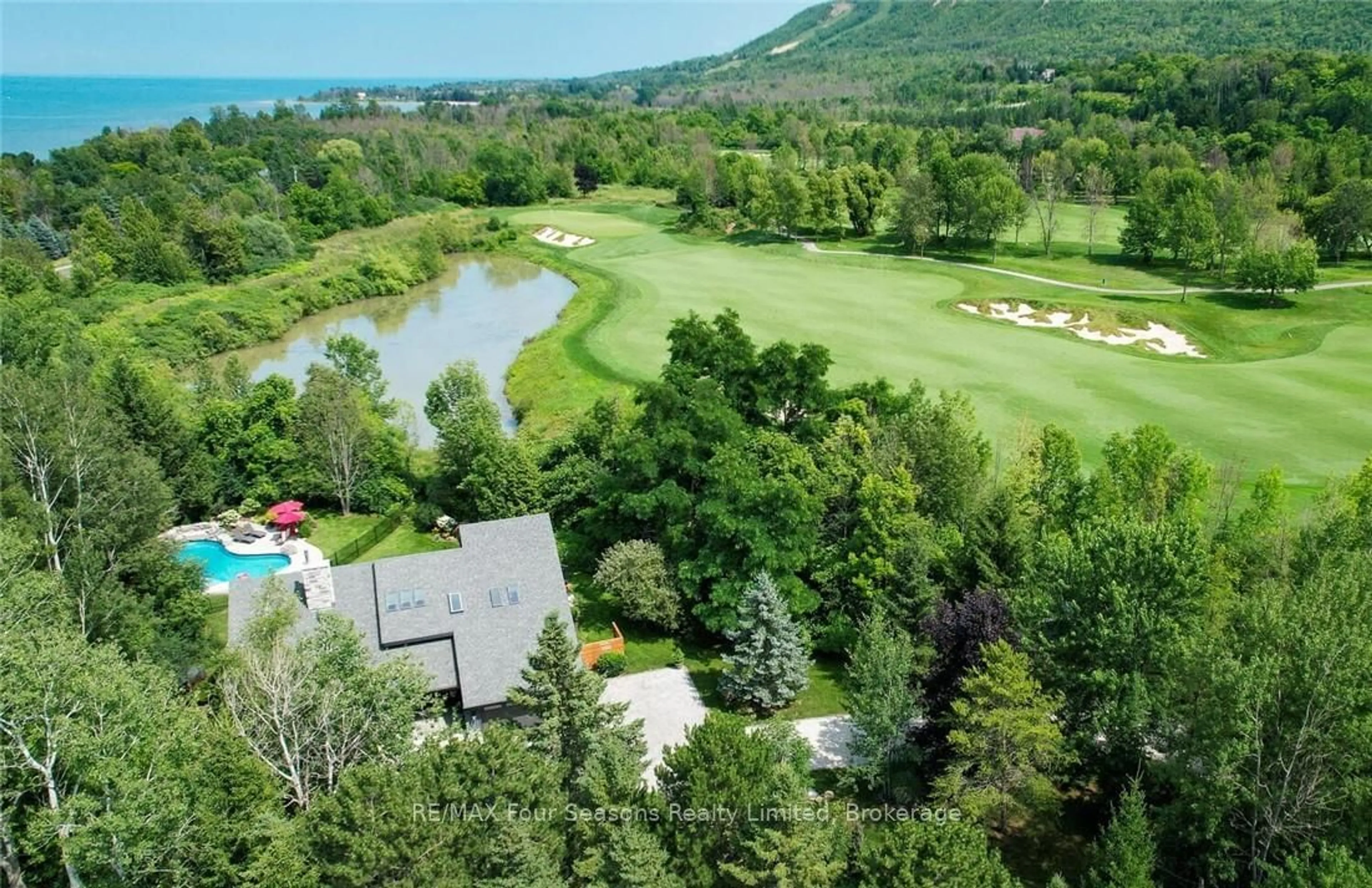 A pic from outside/outdoor area/front of a property/back of a property/a pic from drone, water/lake/river/ocean view for 159 Indian Circ, Blue Mountains Ontario N0H 1J0