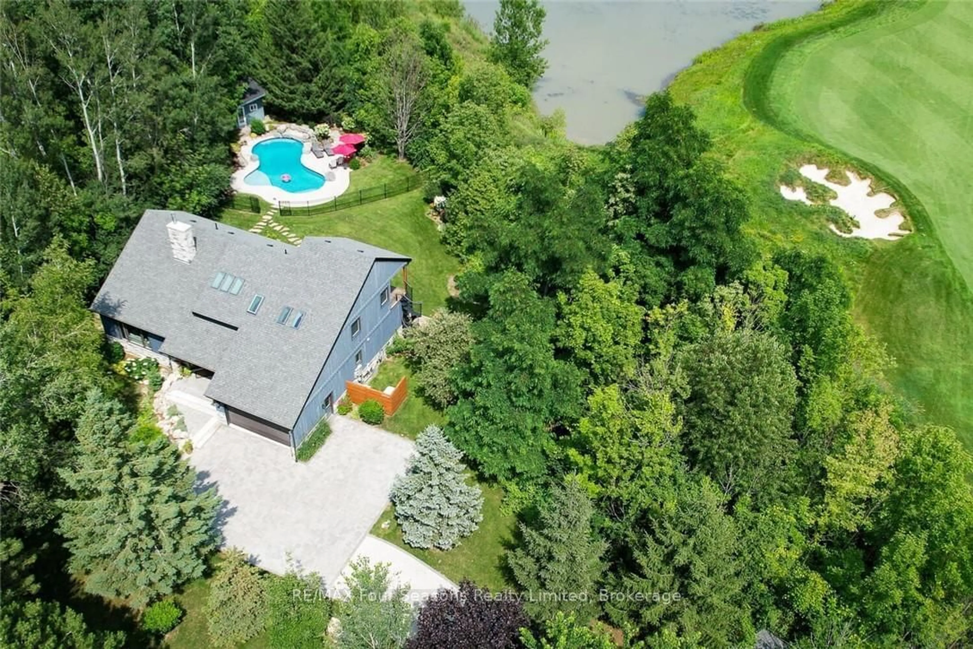 A pic from outside/outdoor area/front of a property/back of a property/a pic from drone, water/lake/river/ocean view for 159 Indian Circ, Blue Mountains Ontario N0H 1J0