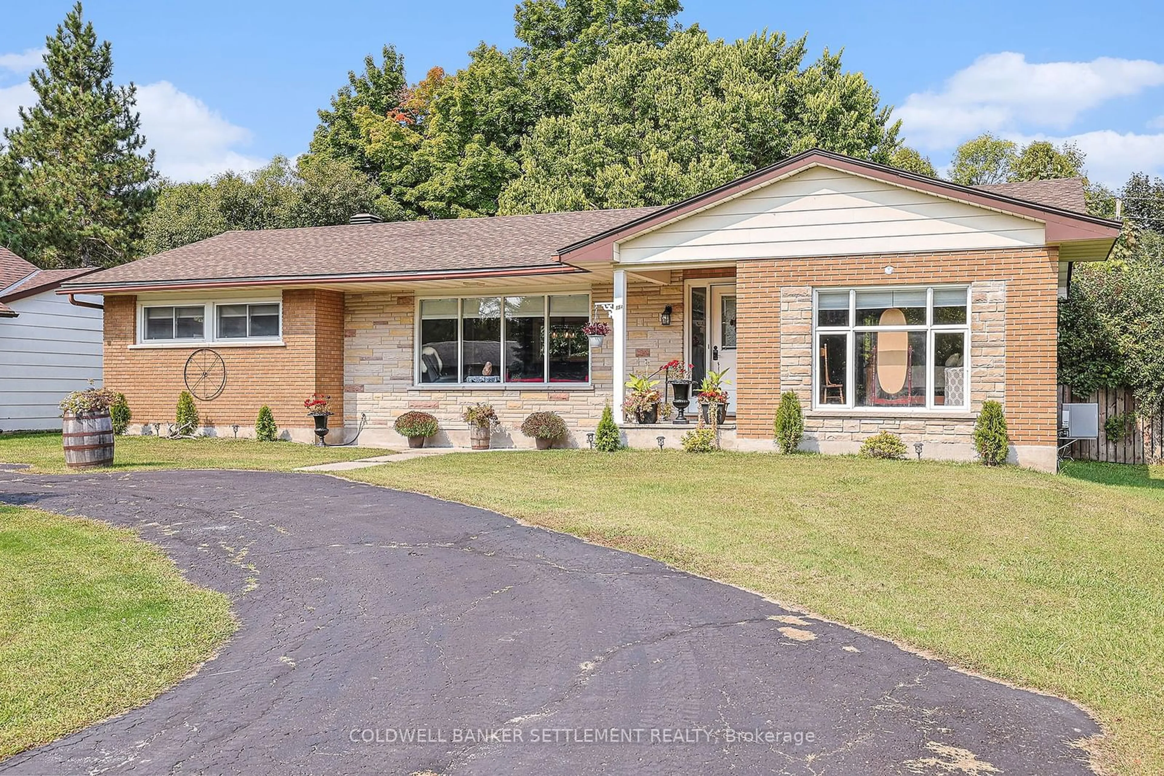 Home with brick exterior material, street for 154 Stamford Dr, Drummond/North Elmsley Ontario K7H 3C1