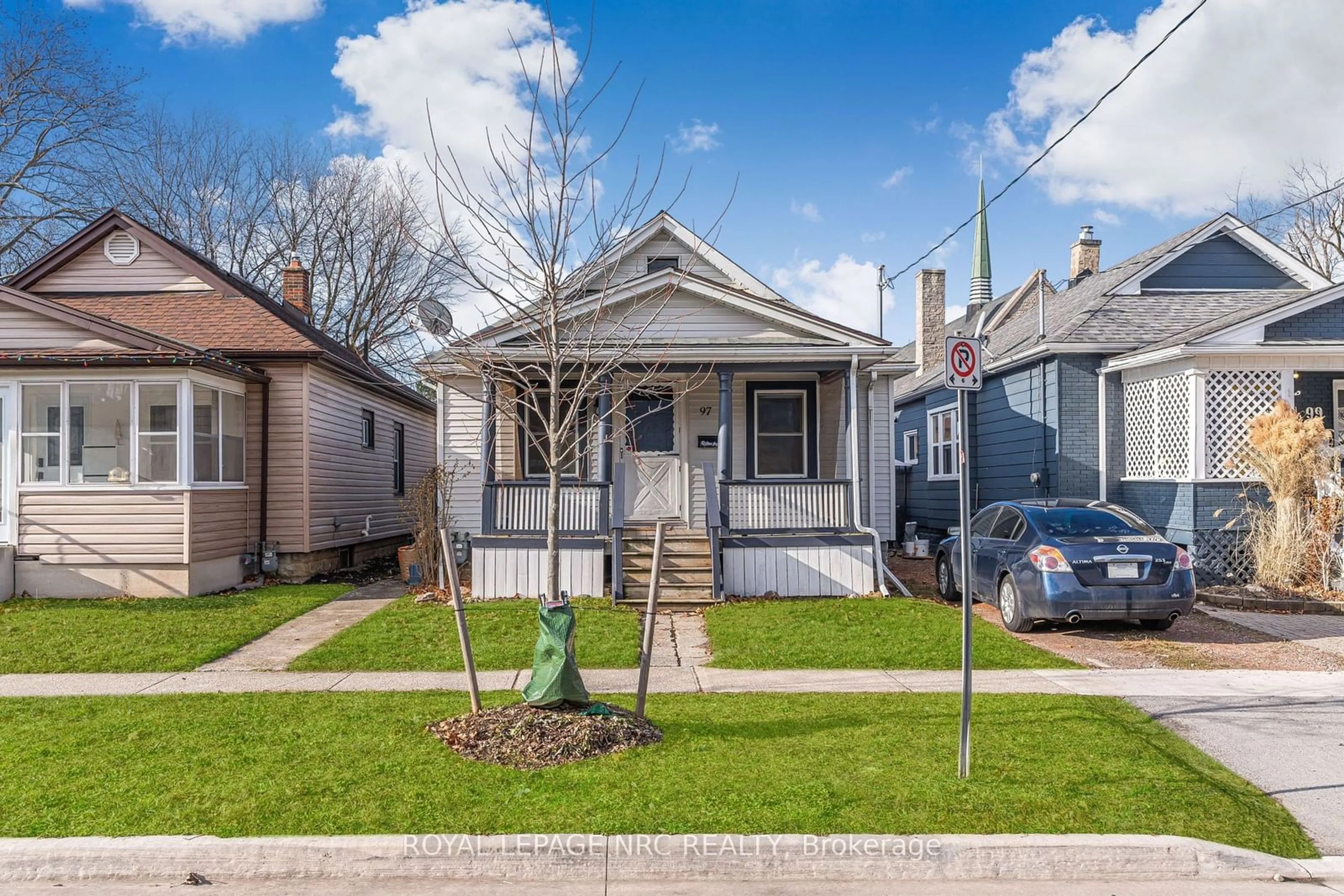 Home with brick exterior material, street for 97 Woodland Ave, St. Catharines Ontario L2R 5A4